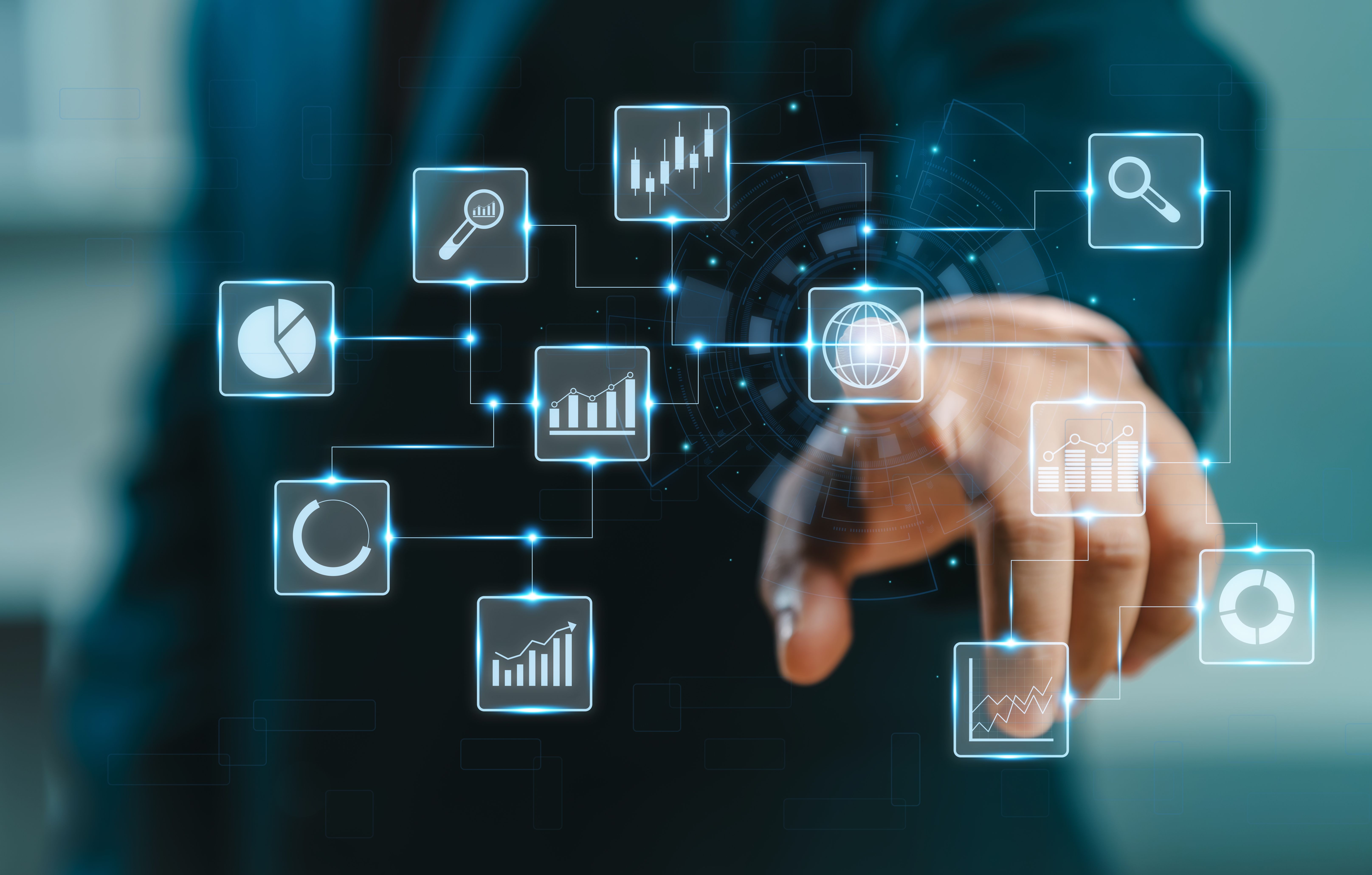 Man touching stock market virtual icons. Business man using Big data for analytics and business intelligence (BI) with chart and graph icons on a digitals screen interface. Online digital and market.