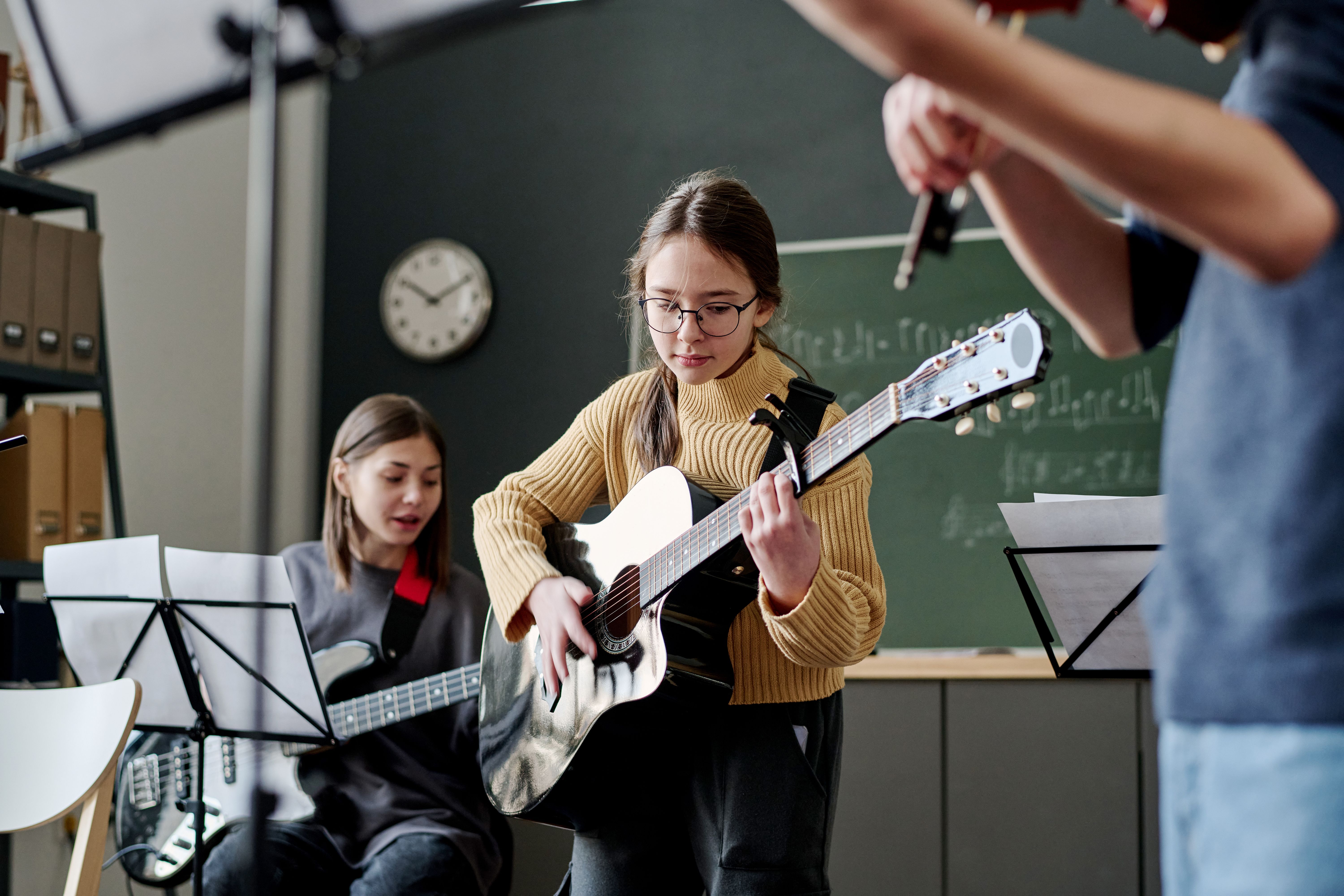 Girl Playing In School Band