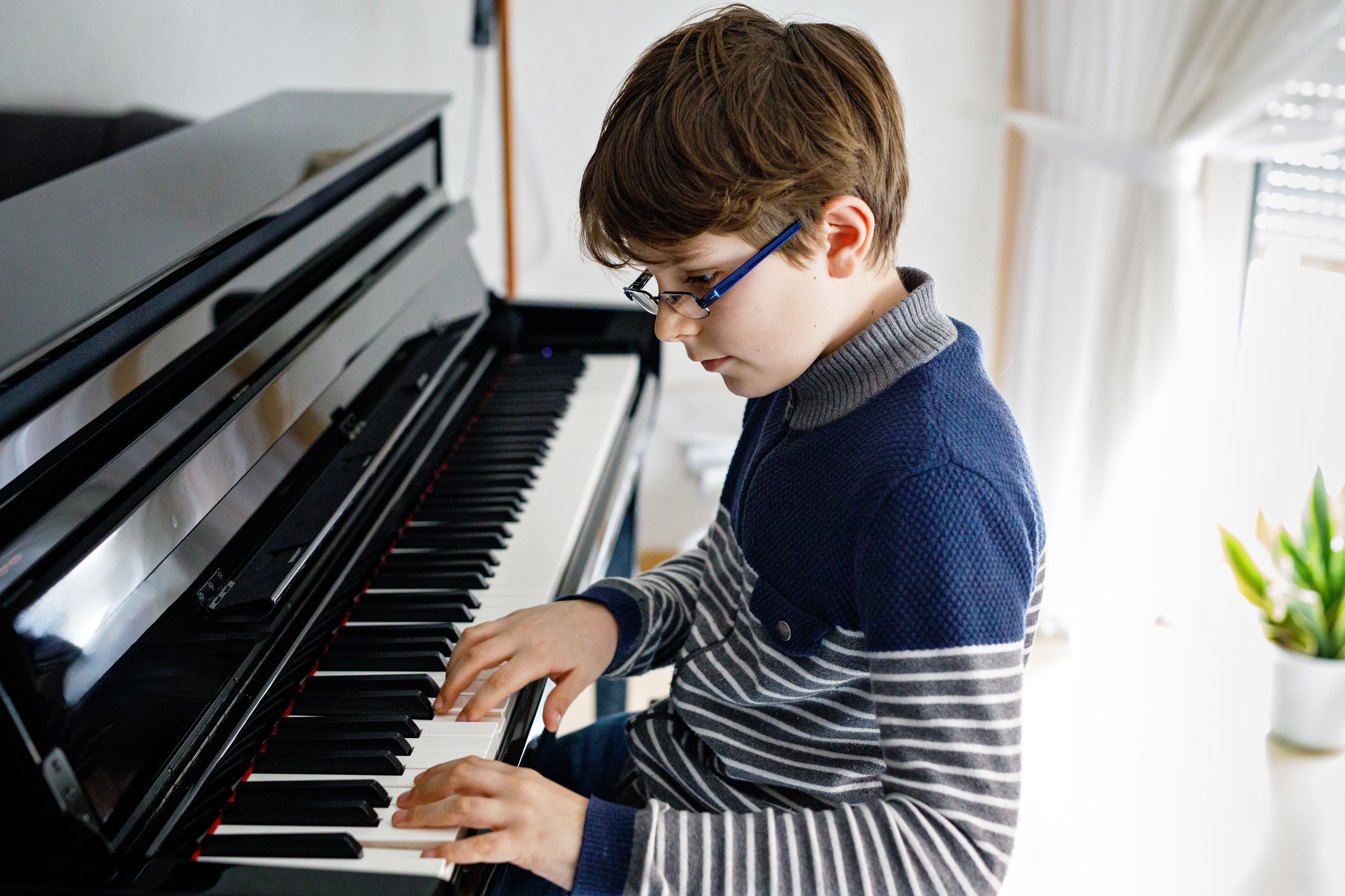child playing piano