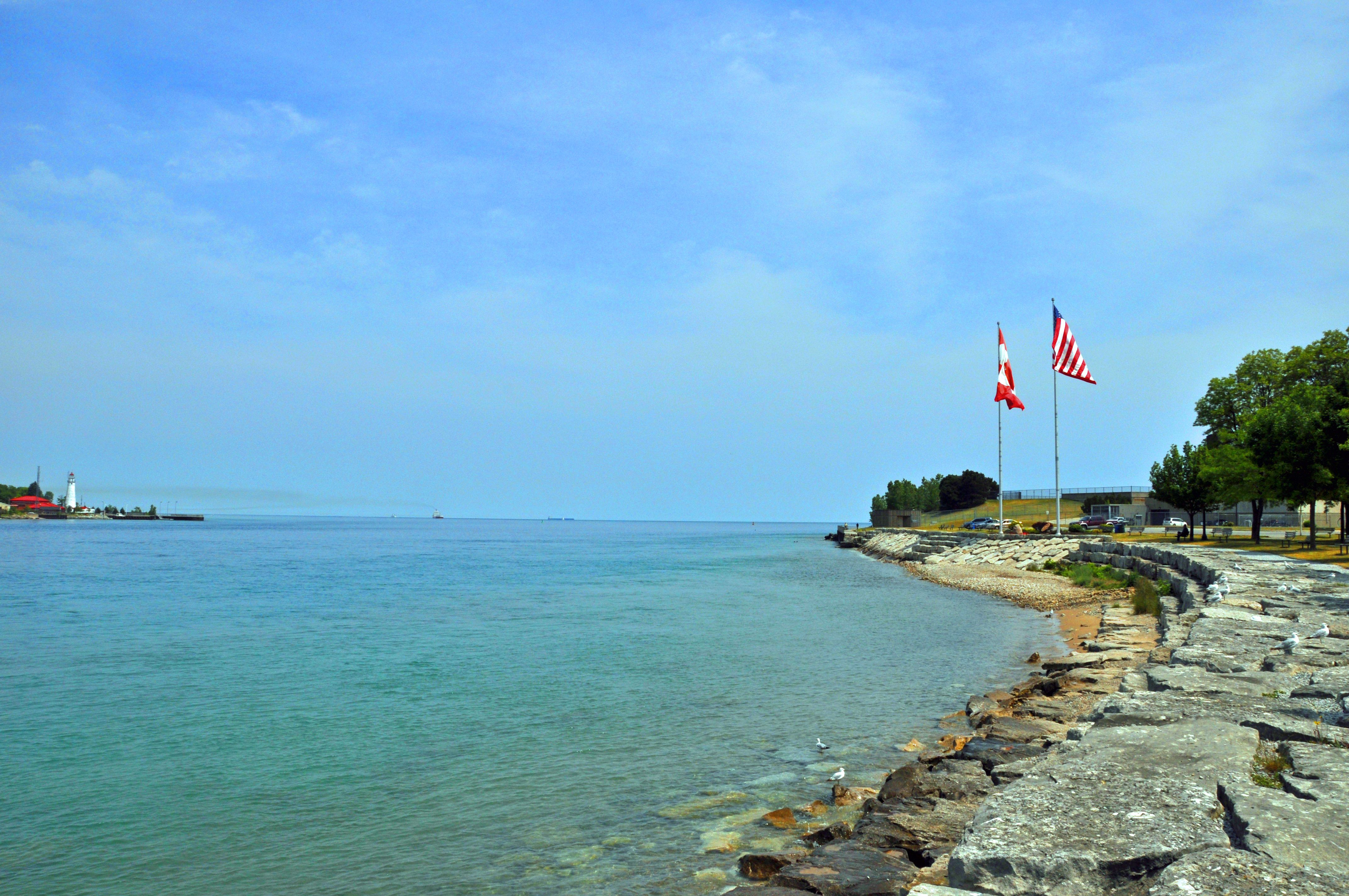 U.S. and Canadian Flags at the mouth of Lake Huron-Sarnia, Canada U.S. and Canadian Flags at the mouth of Lake Huron-Sarnia, Canada