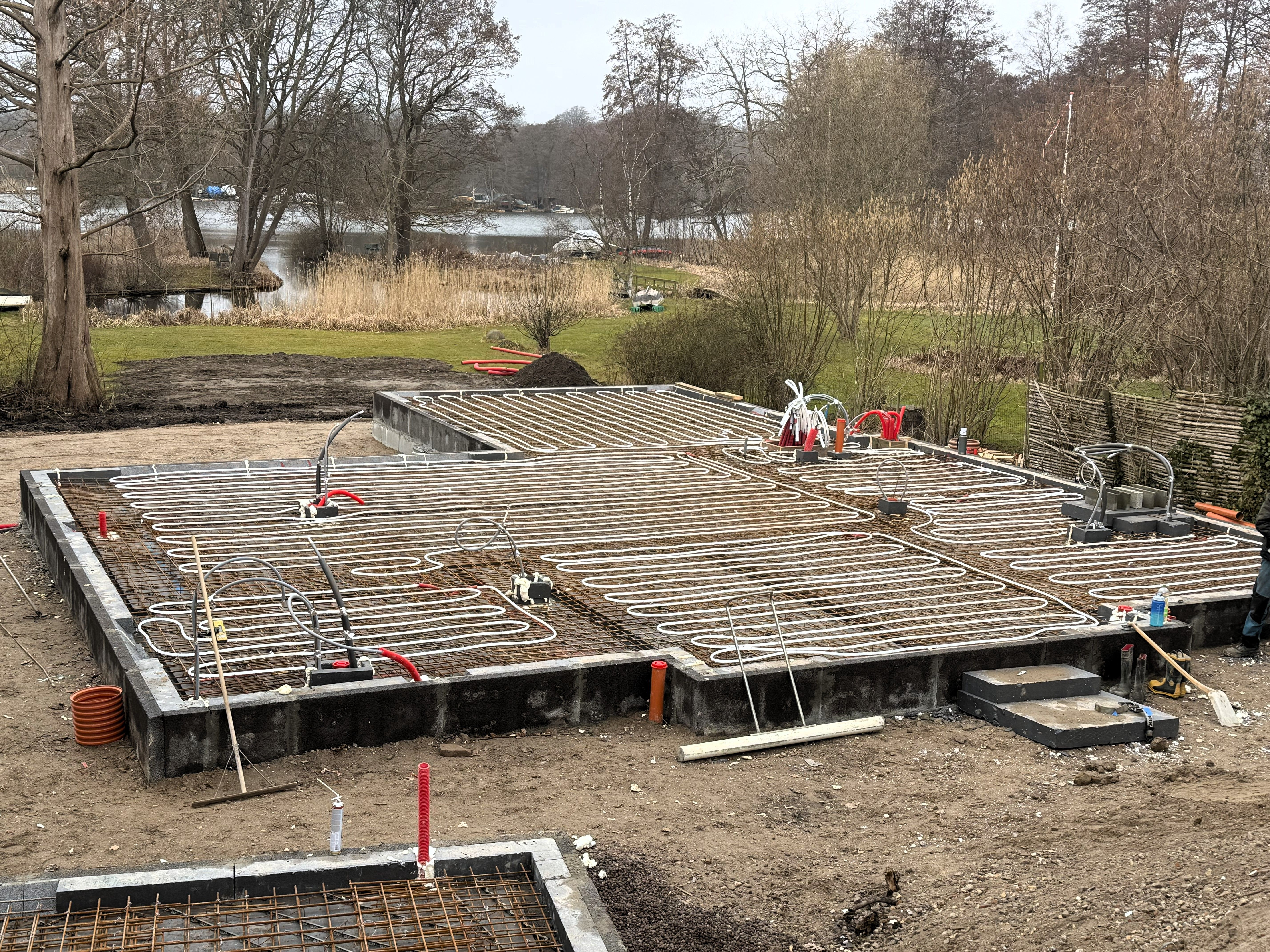 Installing Underfloor Heating Pipes in villa under construction Installing Underfloor Heating Pipes in villa under construction