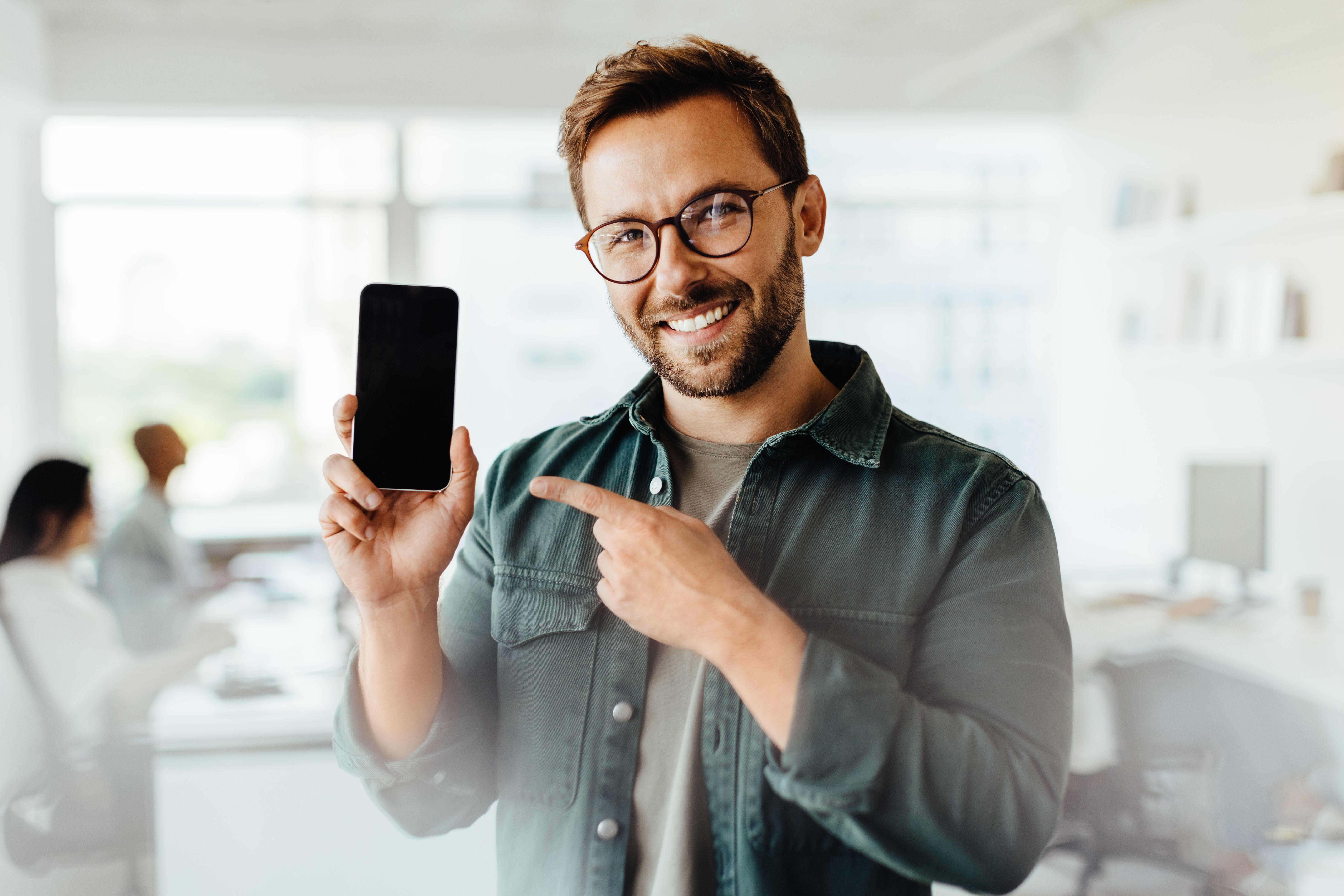 happy customer with repaired gadget