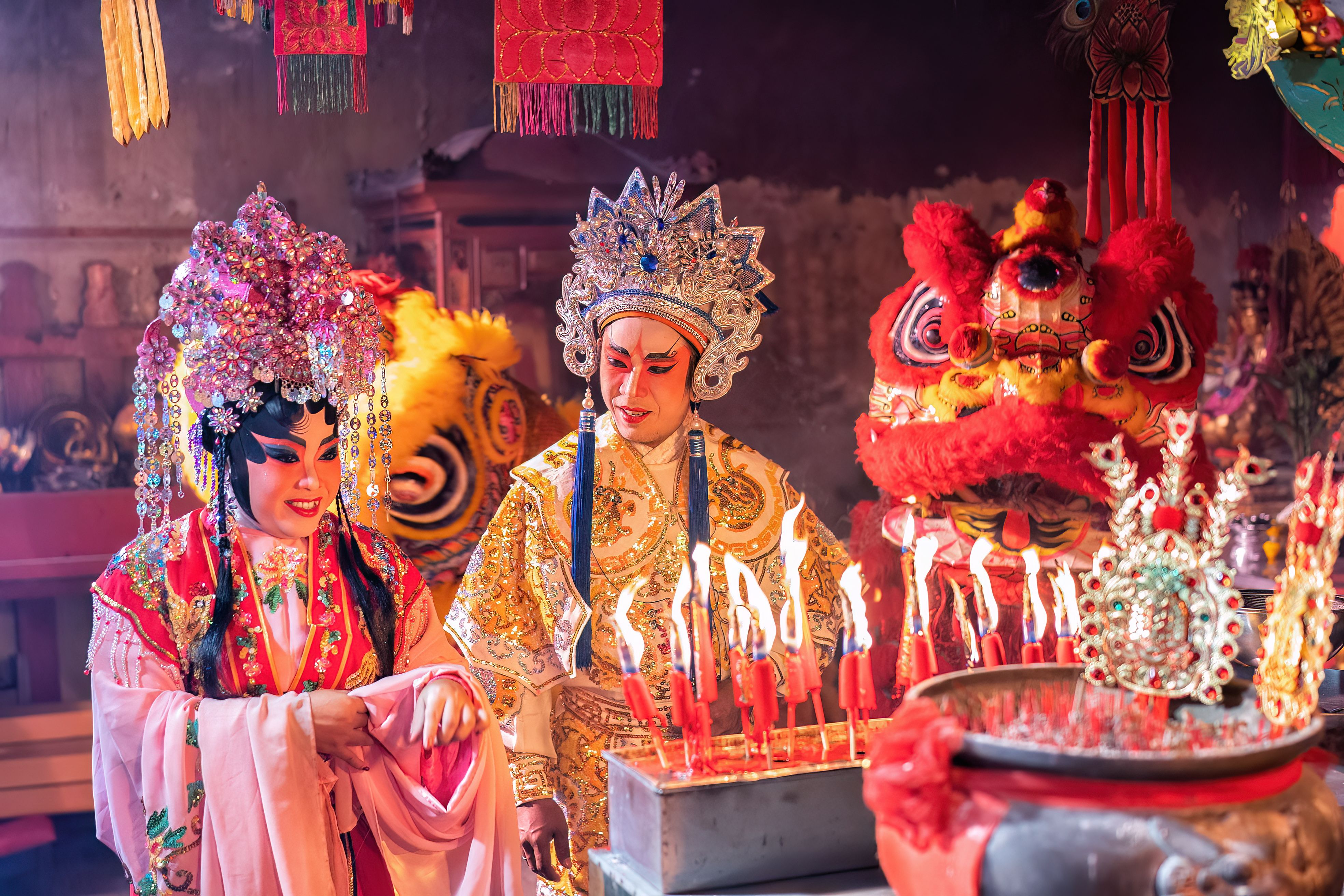 Chinese opera actor Light candle pray to god for prosperity on the occasion of the Chinese New Year