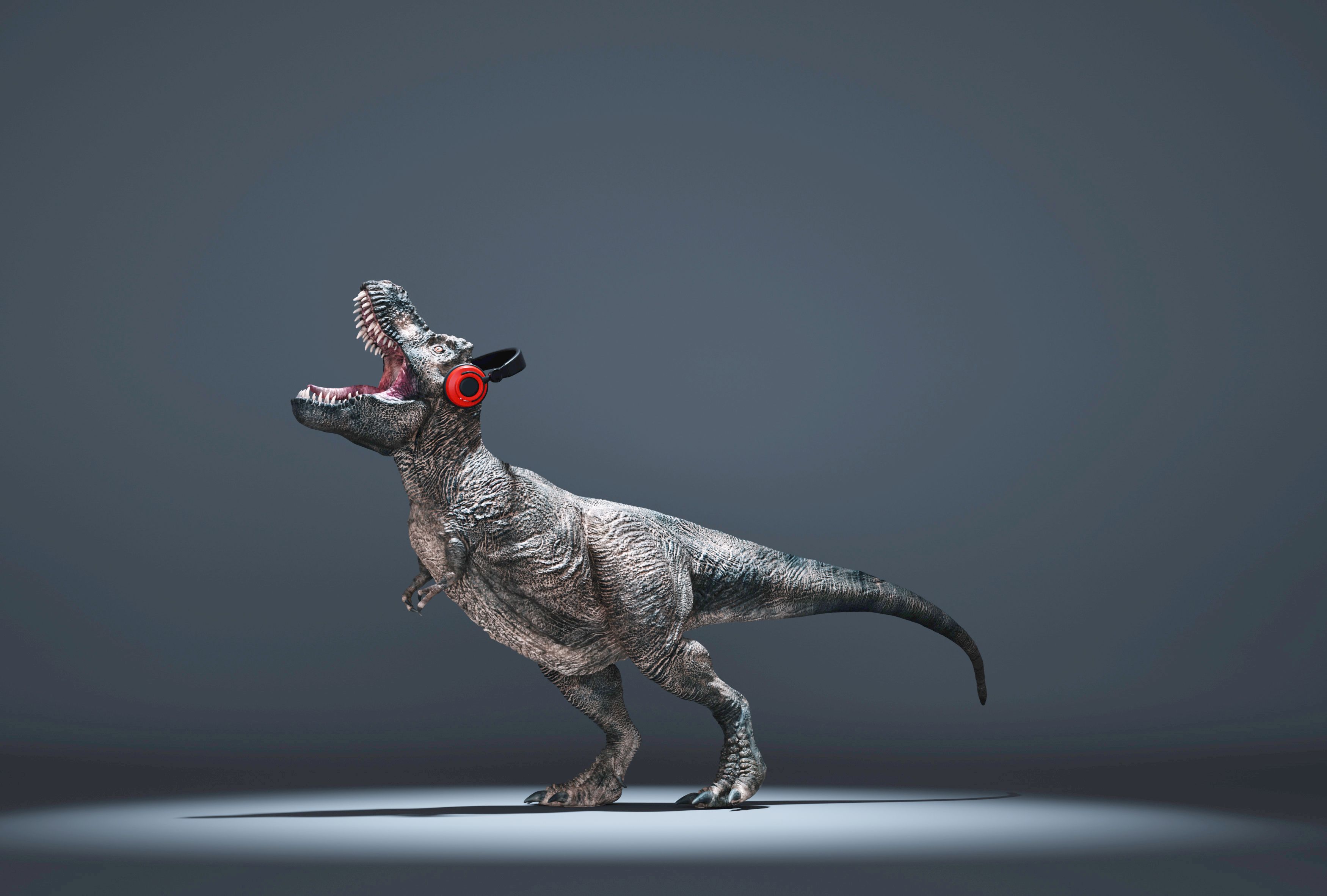 Tyrannosaurus Rex with headphones on a blue background.