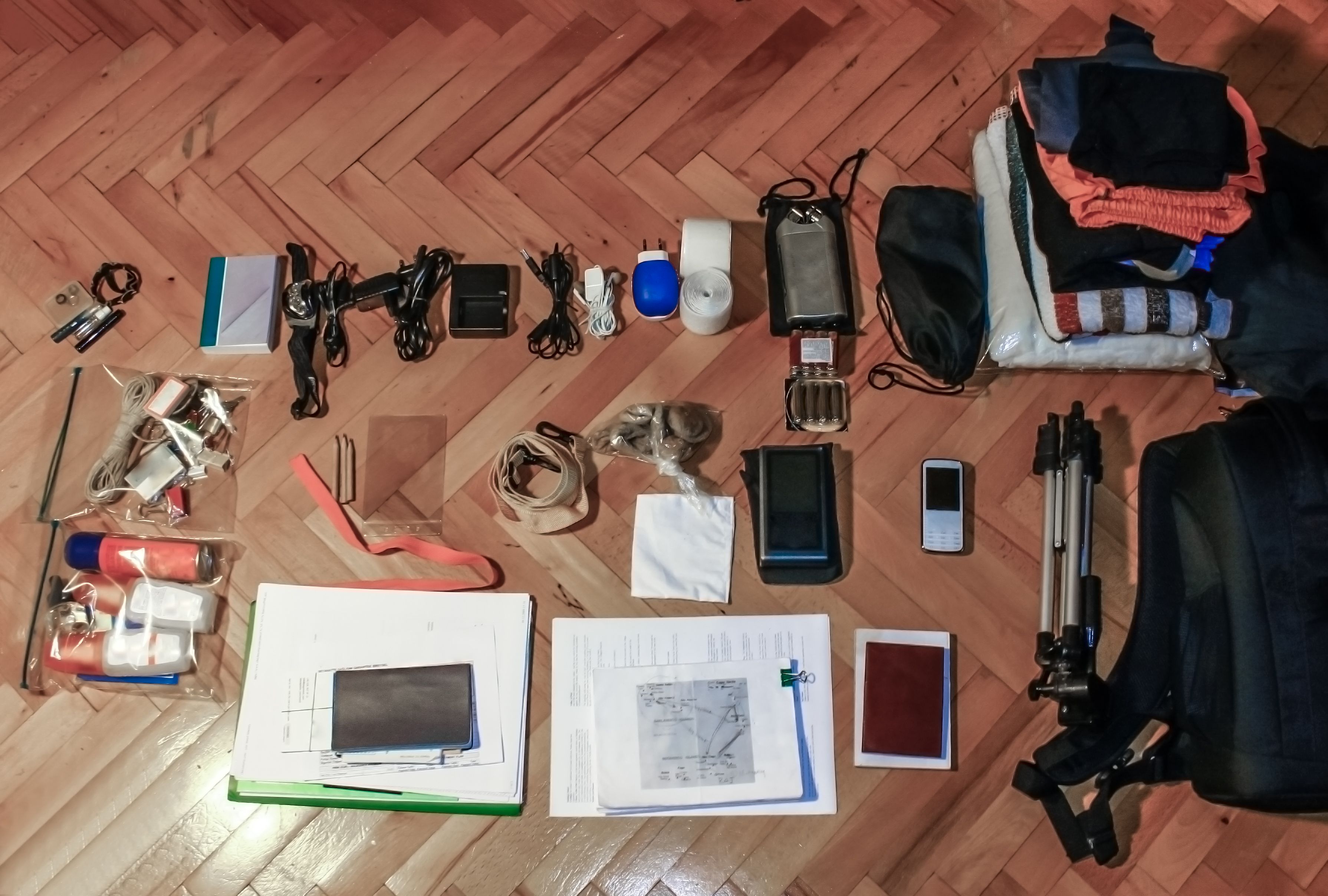 Top view of bag content travel accessories collection Top view of bag content travel accessories collection