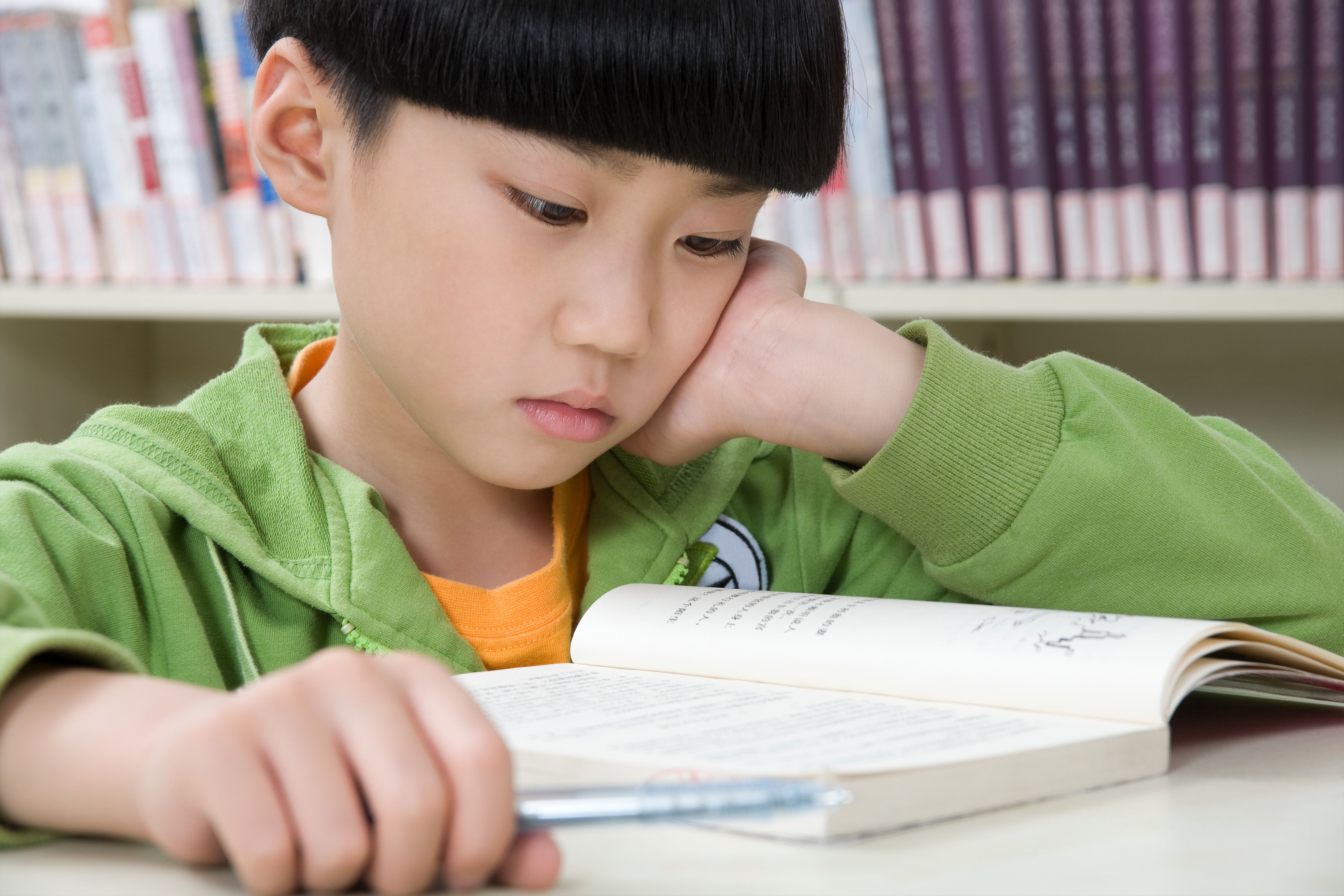 child reading book