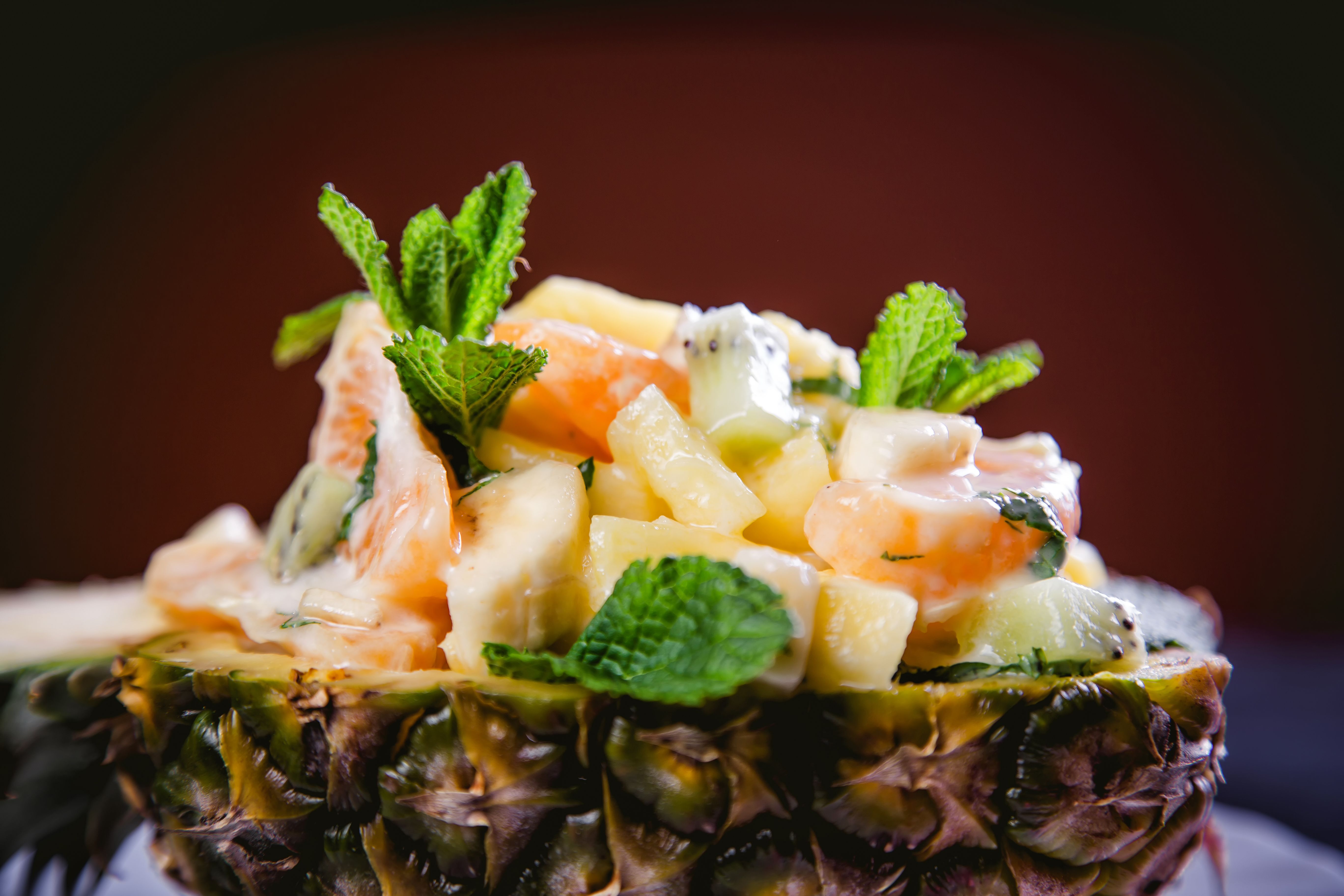 Dessert fruktov?y salad in a plate of pineapple
