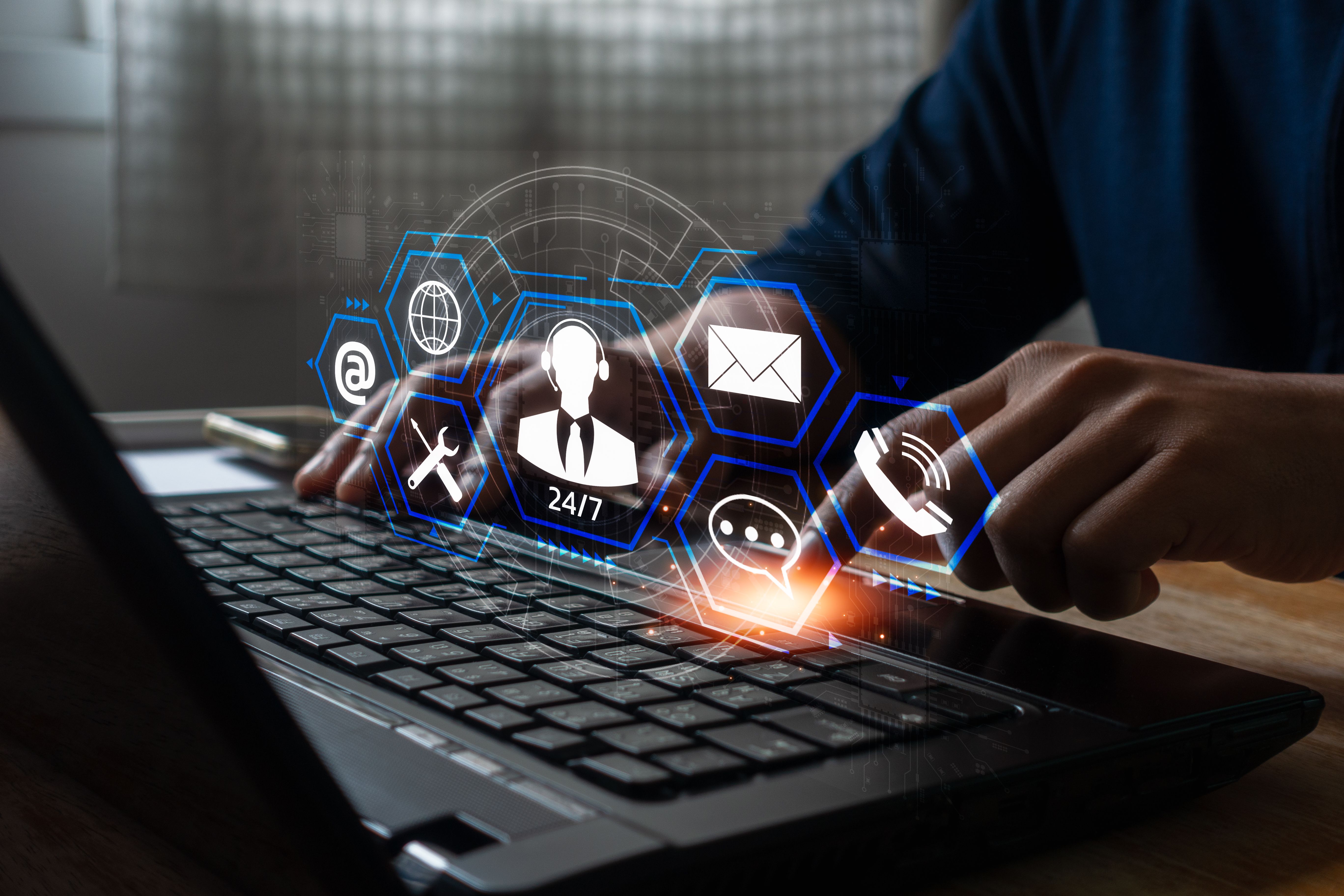 Technical support customer service business with Ai automated technology concept. Technician helpdesk hand using computer laptop to online assistance to client by internet tech. IT support call center