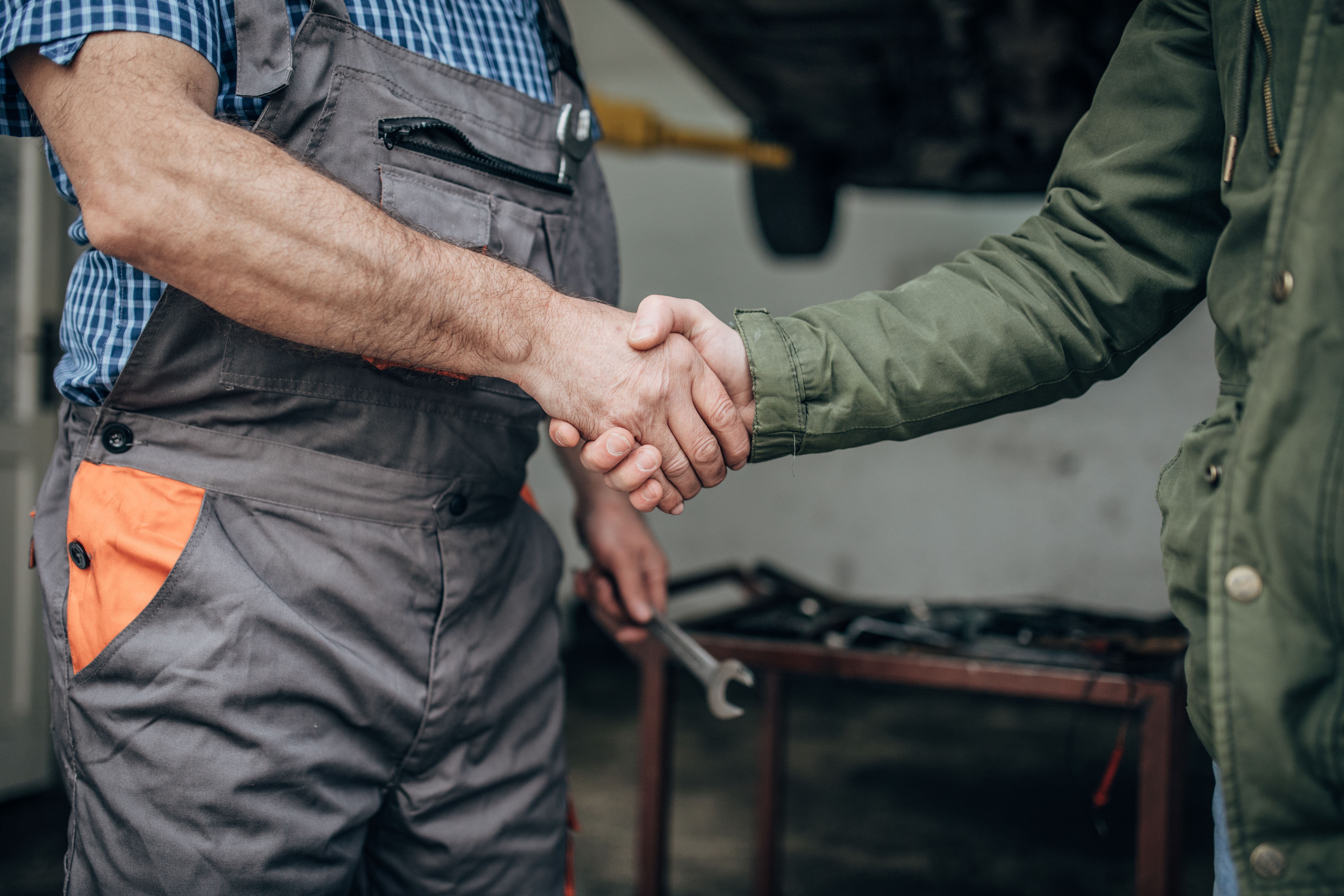 auto mechanic handshake