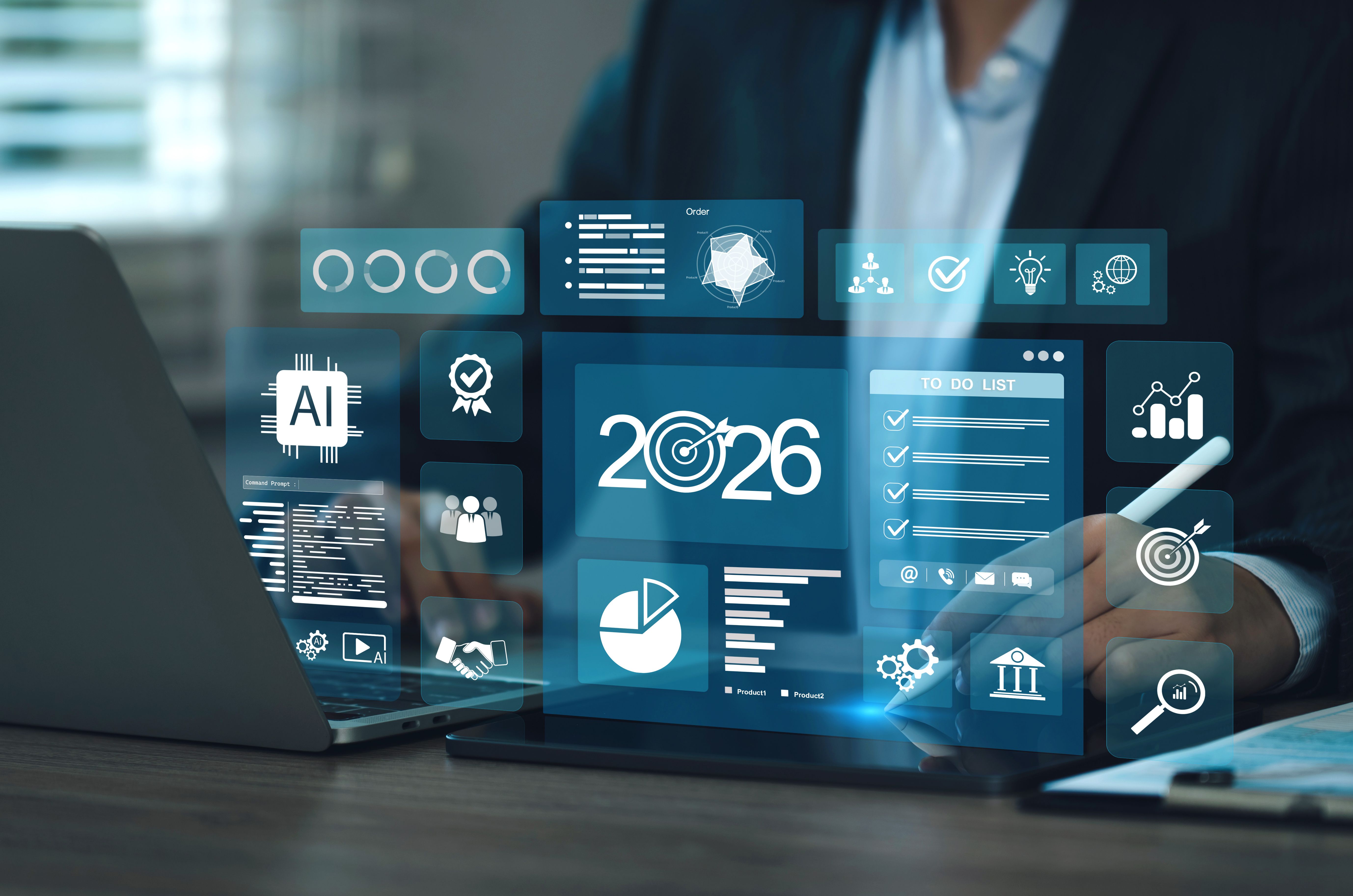 business using a tablet with holographic dashboards showing 2026, AI icons, to do list, charts, and KPIs representing business goals, planning, forecasting, data analytics, and digital transformation.