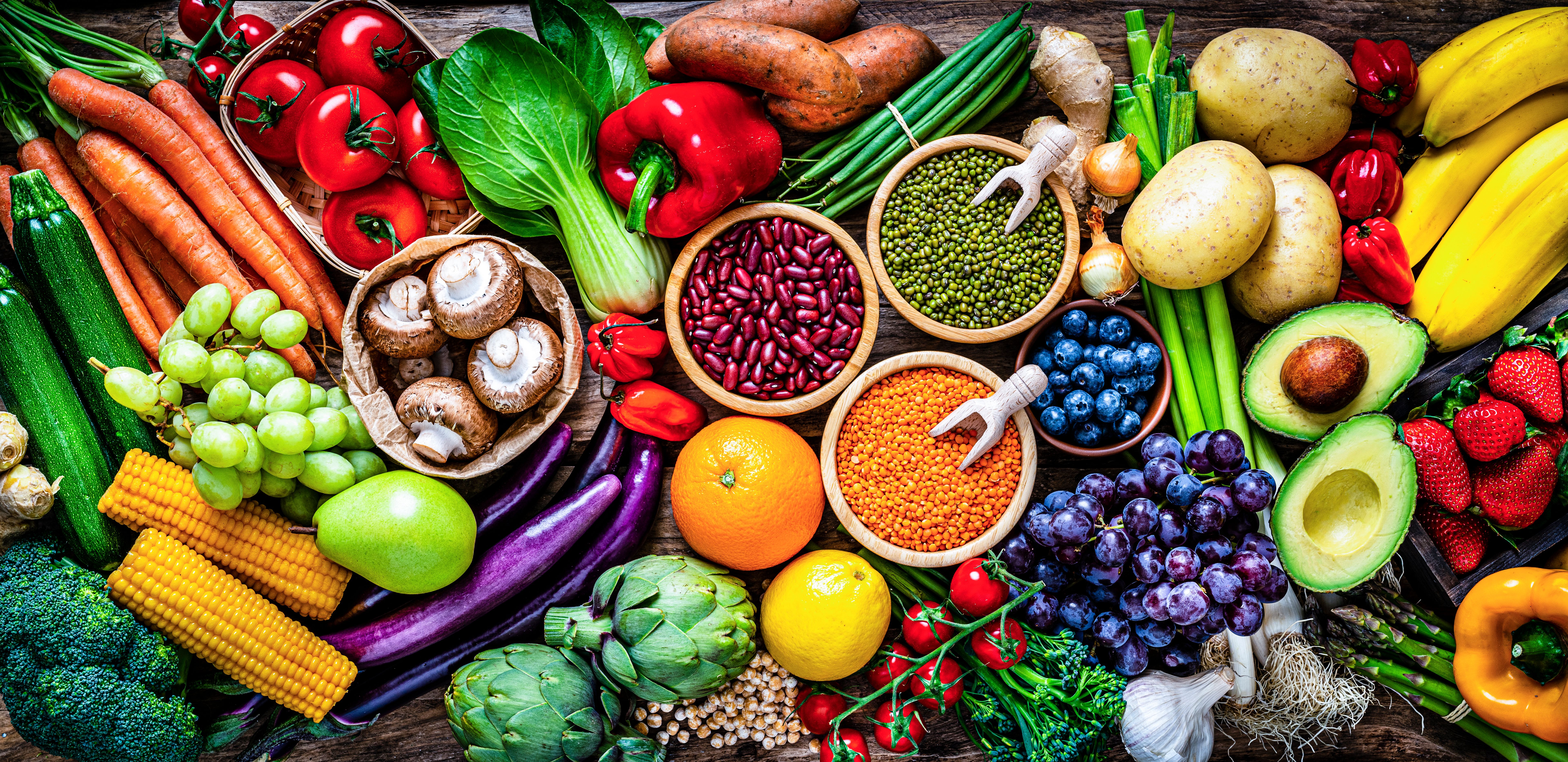 Fresh organic vegetables and legumes panoramic background Fresh organic vegetables and legumes panoramic background