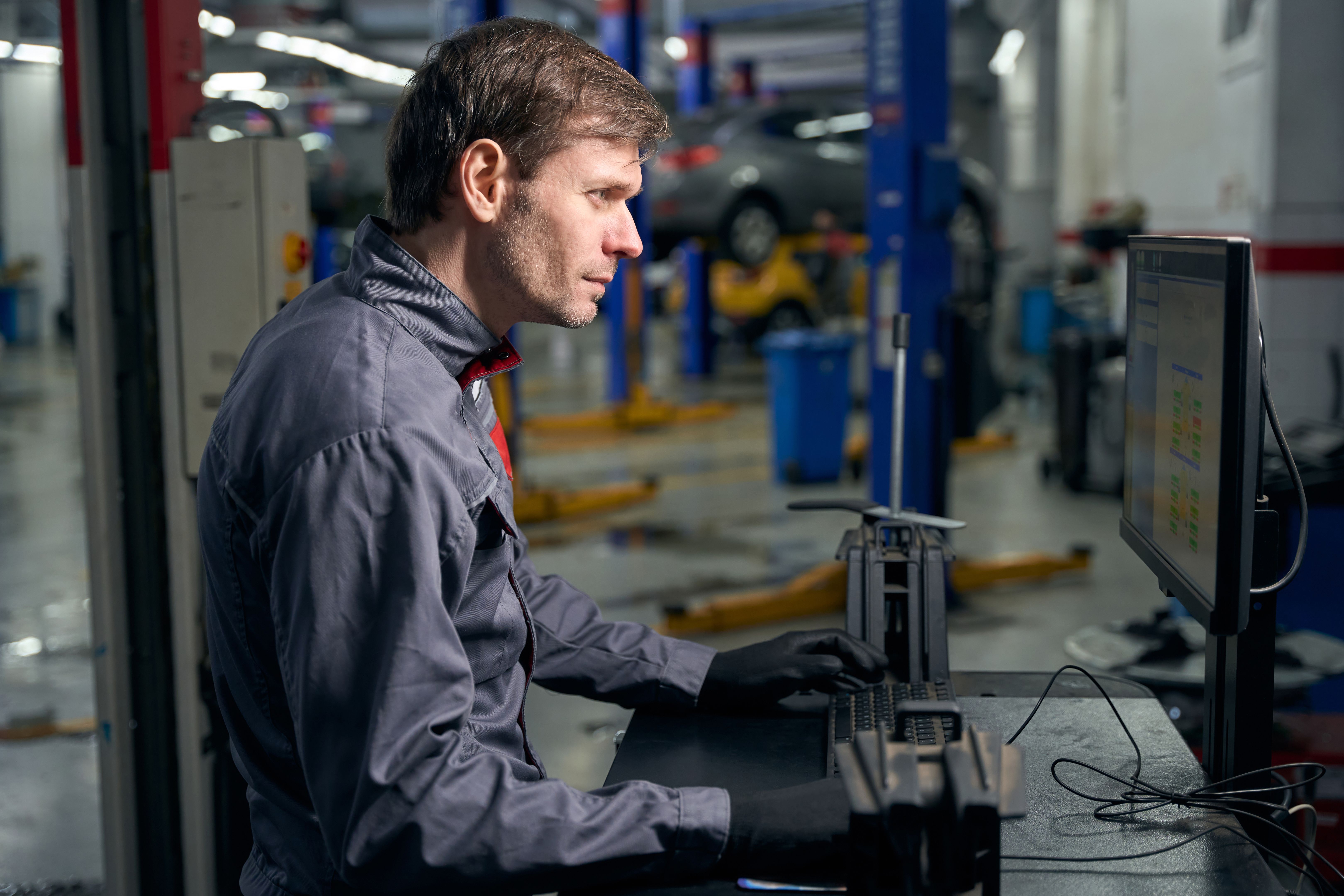 technician calibrating car