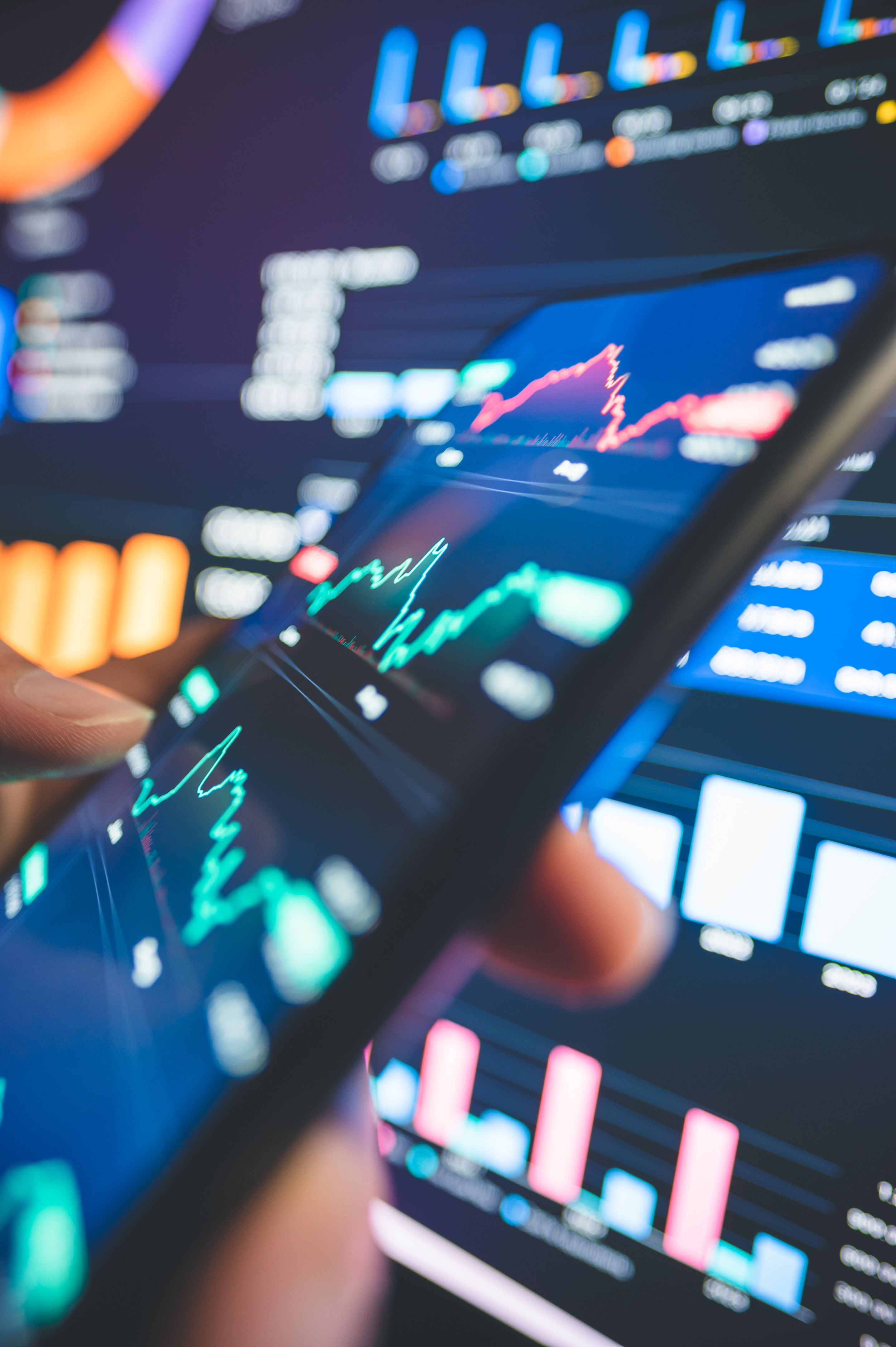 Senior investor interacts with a modern trading interface, navigating vivid stock charts and market trends. Perfect for illustrating financial forecasting and strategies amidst market fluctuations. Senior investor interacts with a modern trading interface, navigating vivid stock charts and market trends. Perfect for illustrating financial forecasting and strategies amidst market fluctuations.