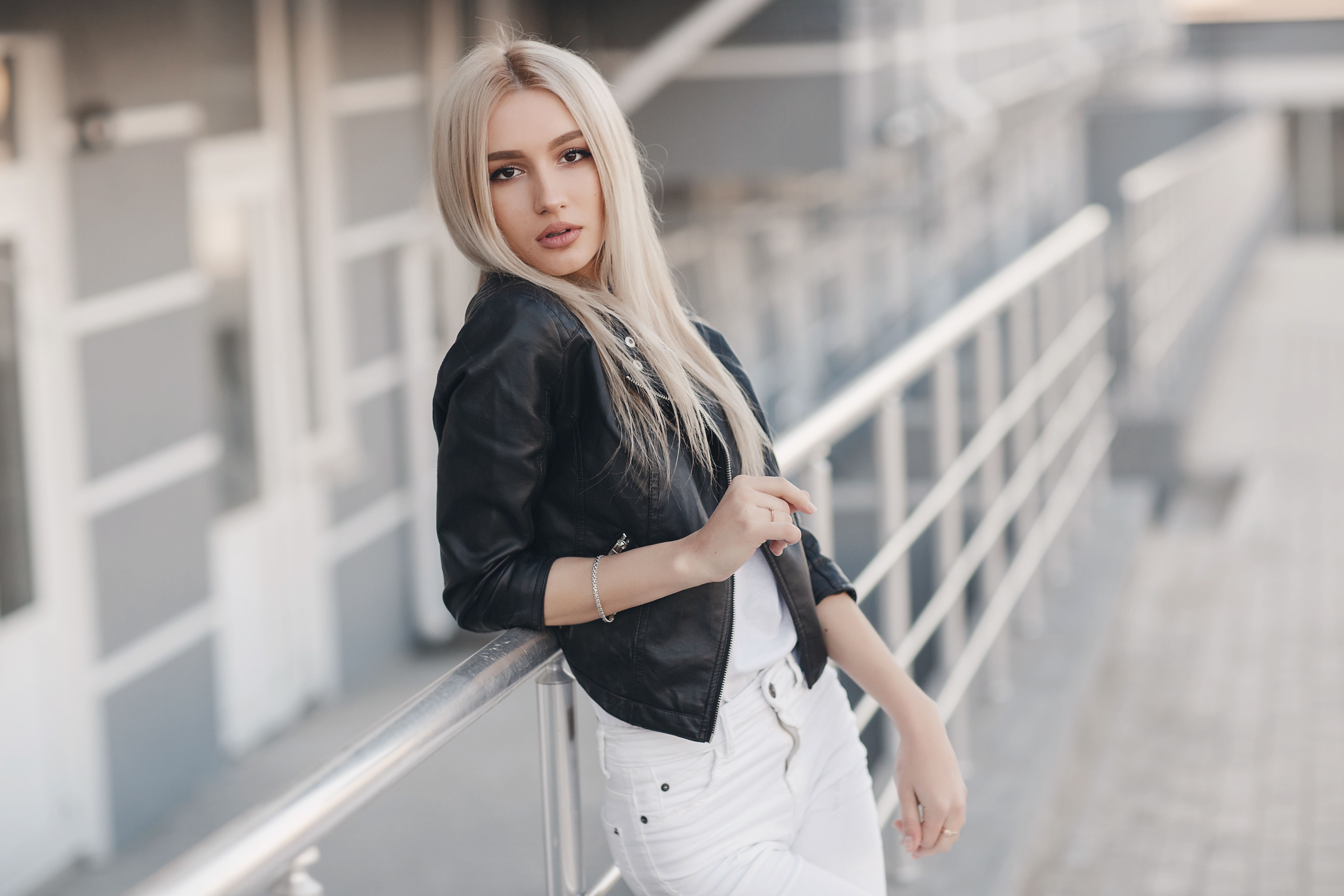 Outdoor summer portrait of a beautiful young woman outdoors in the city Outdoor summer portrait of a beautiful young woman outdoors in the city