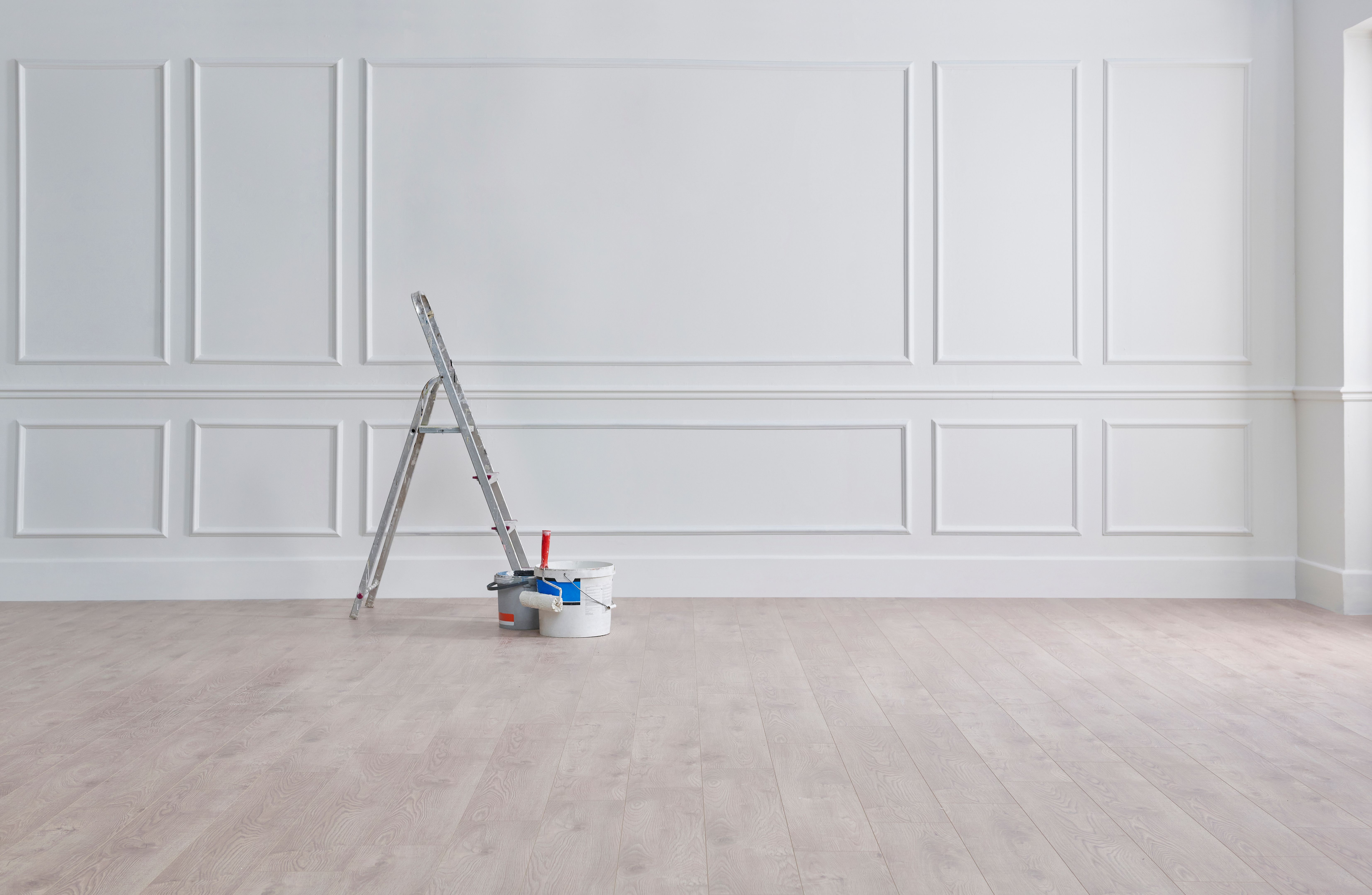 White classic wall, stairs, paint and brush, interior whitewash.