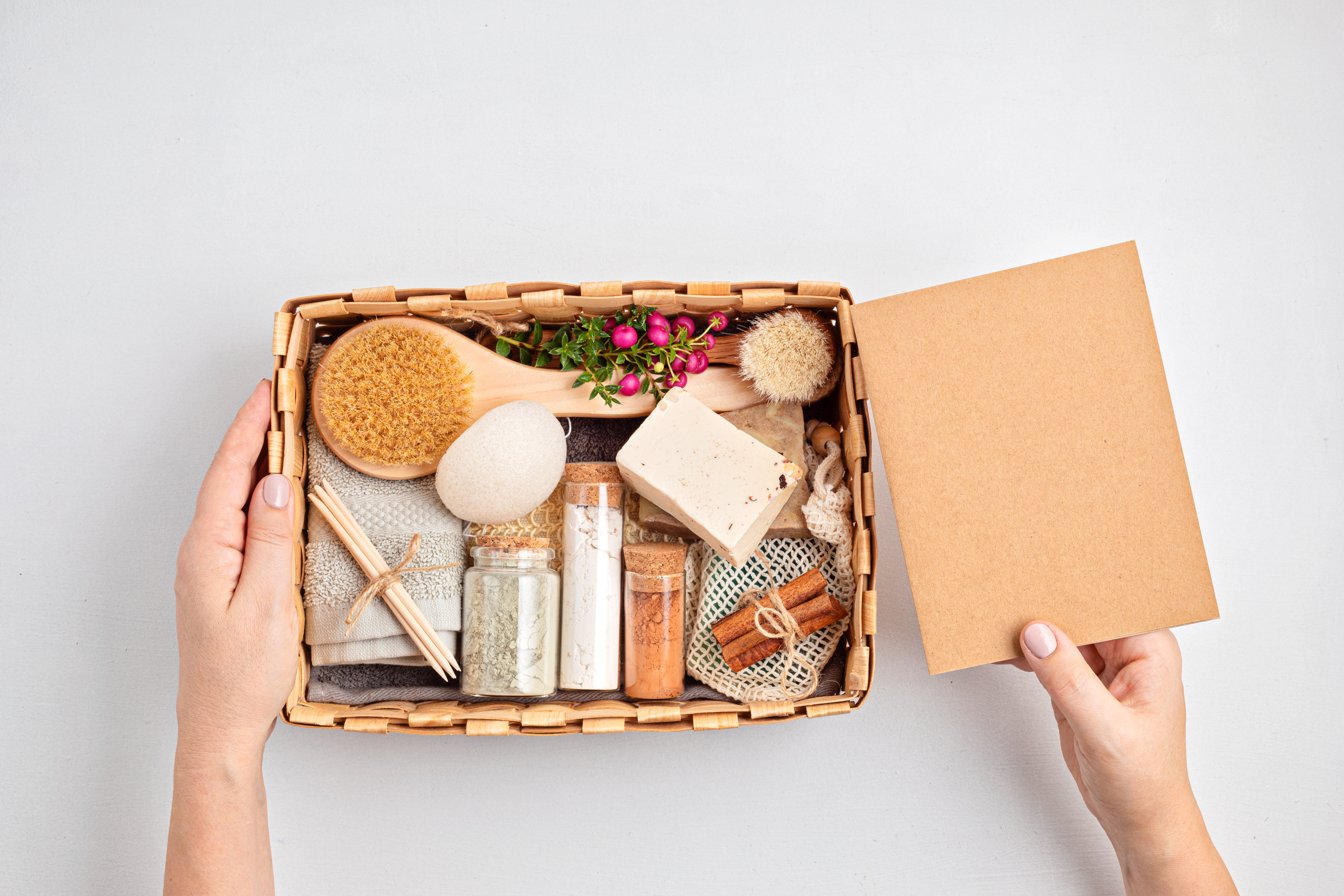 Preparing self care package, seasonal gift box with plastic free zero waste cosmetics products