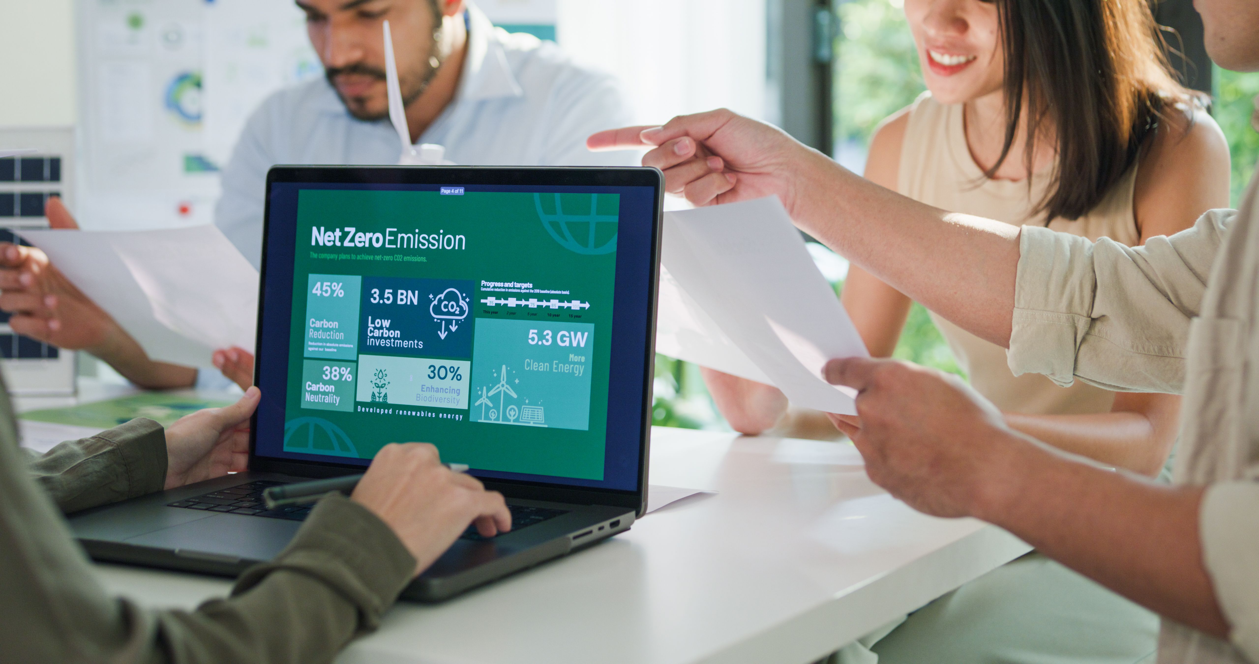 Closeup group Asia businesspeople talk ESG strategies risk management workshop, SDGs report, global warming, green finance and investment and net zero waste in boardroom training building. Closeup group Asia businesspeople talk ESG strategies risk management workshop, SDGs report, global warming, green finance and investment and net zero waste in boardroom training building.