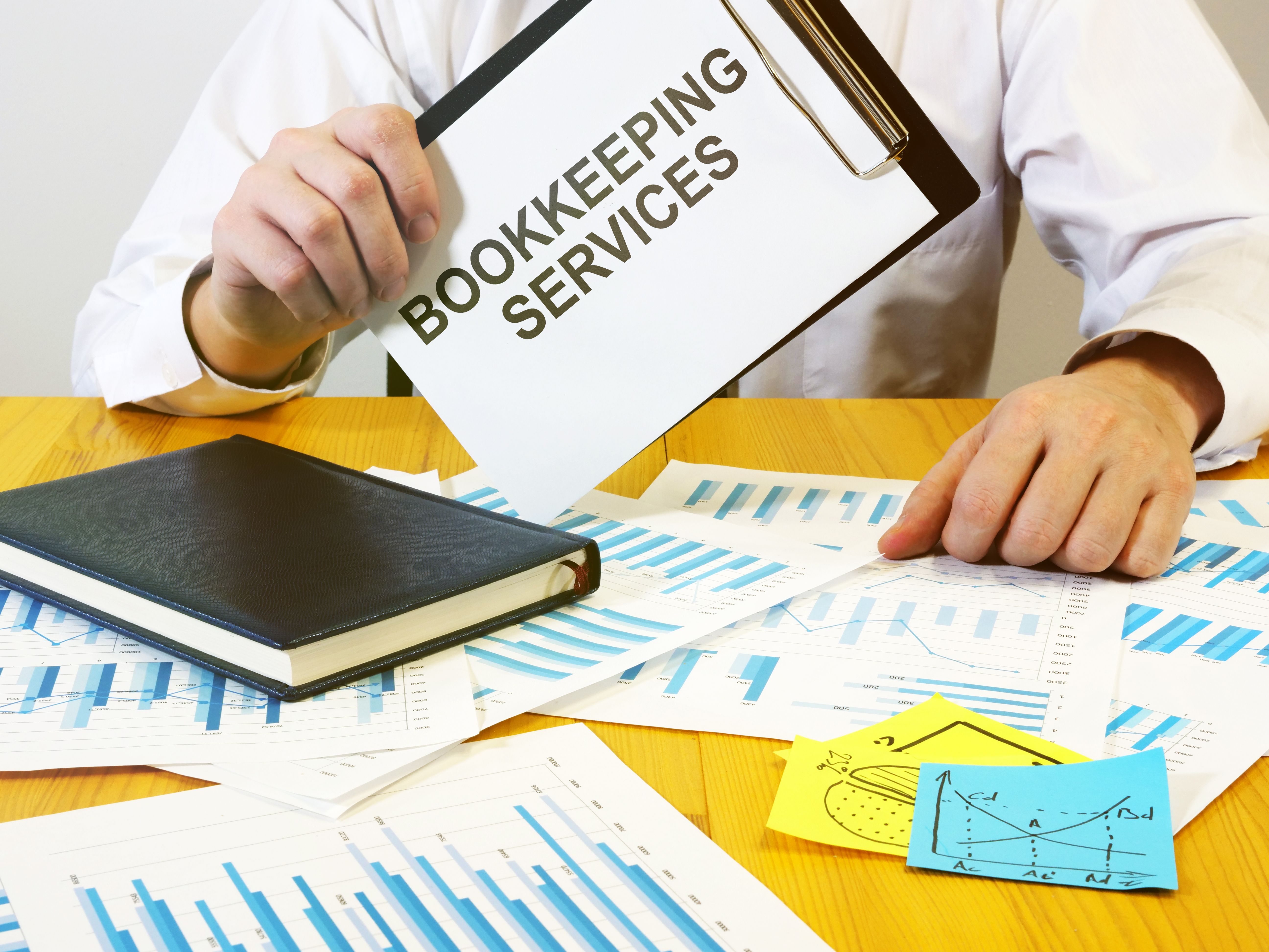 Writing note shows the text bookkeeping services Writing note shows the text bookkeeping services