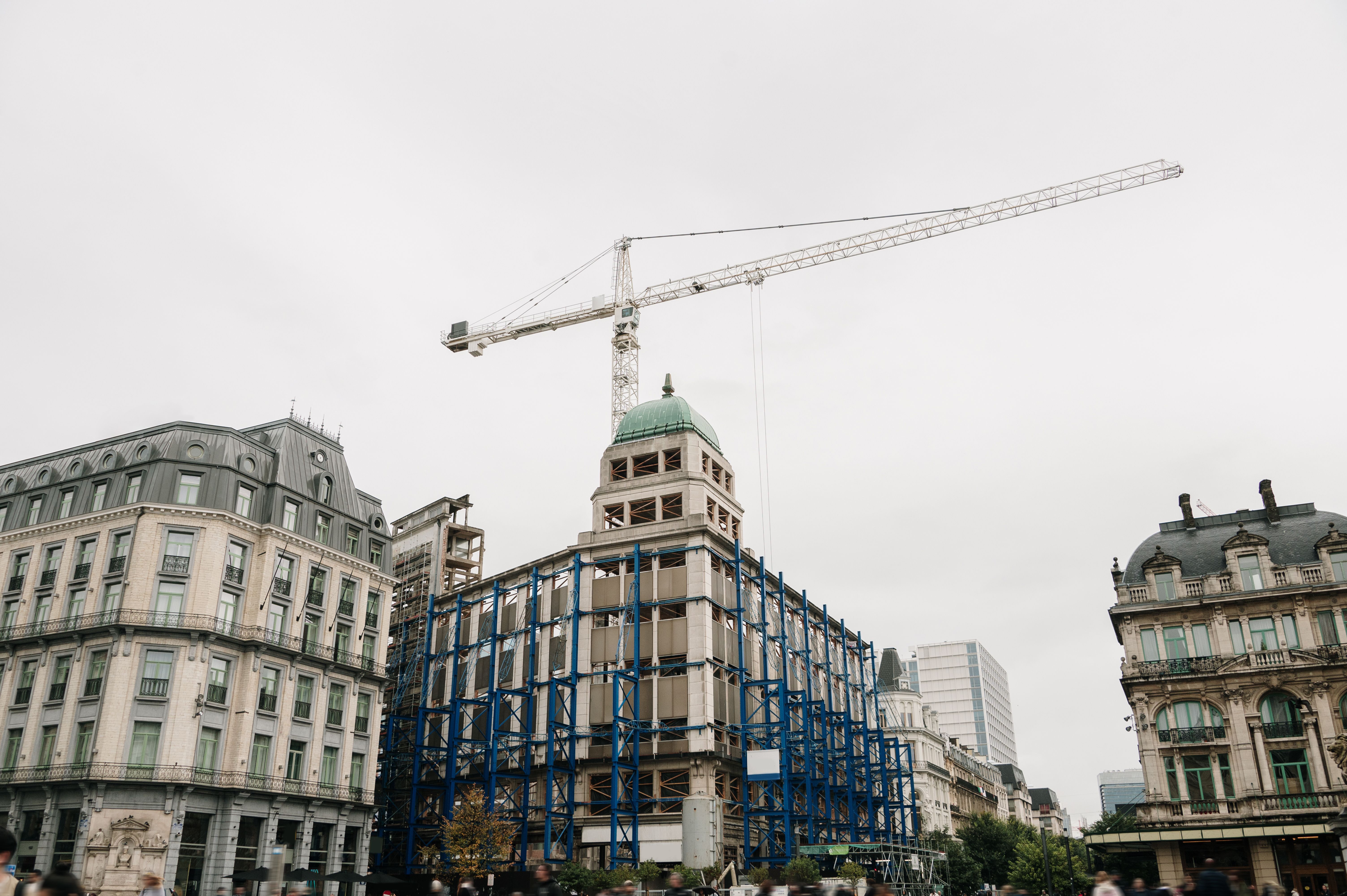 Building under construction in a city