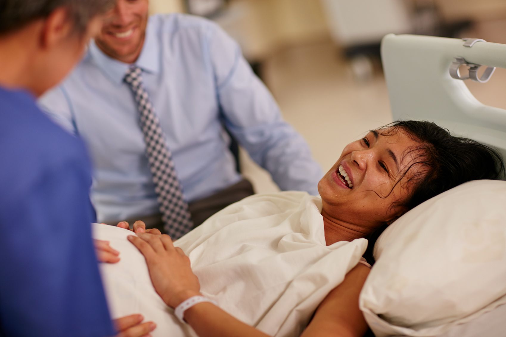 woman undergoing mammogram