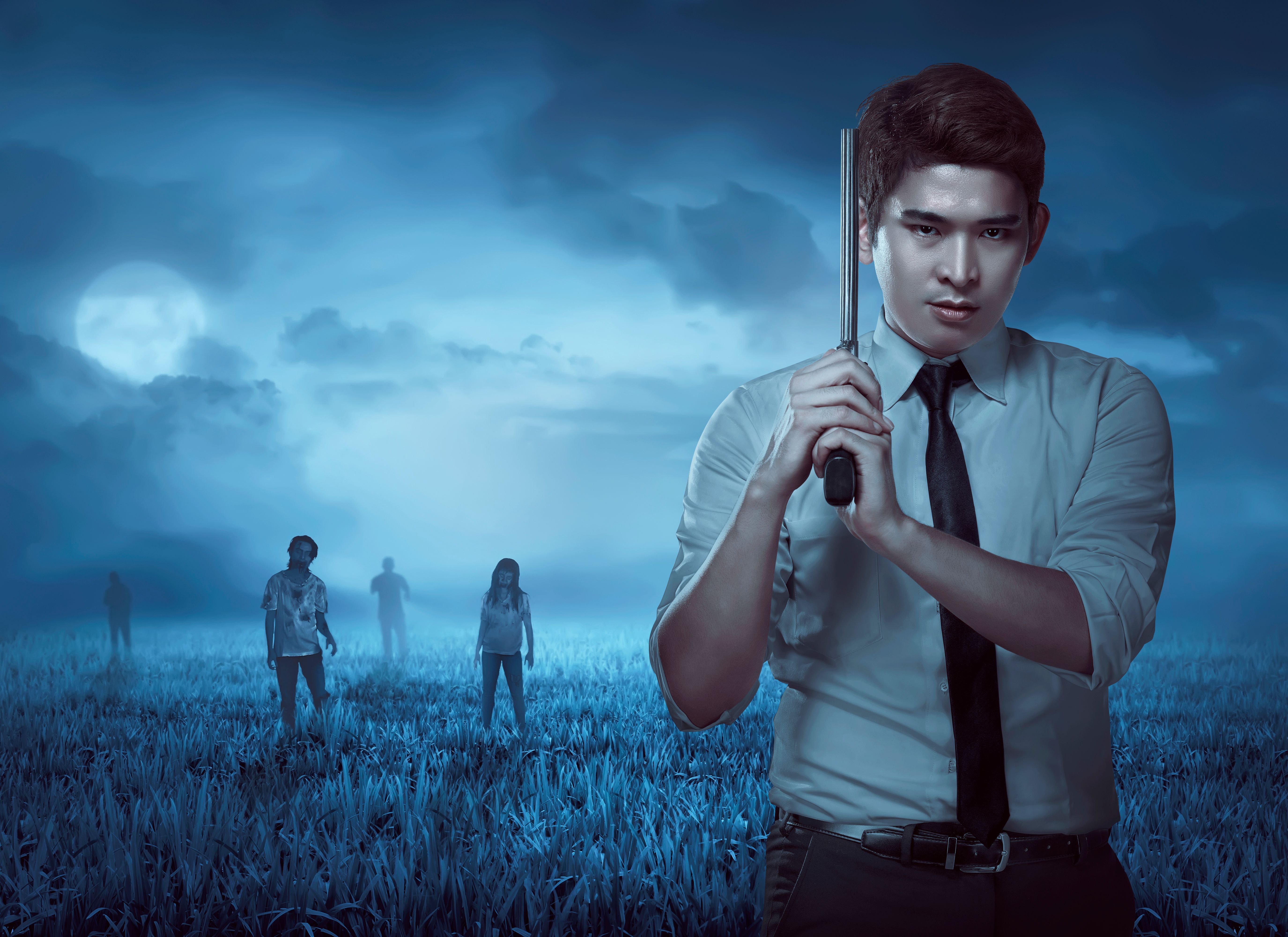 Secret Agent Holding Gun, ready shooting zombie