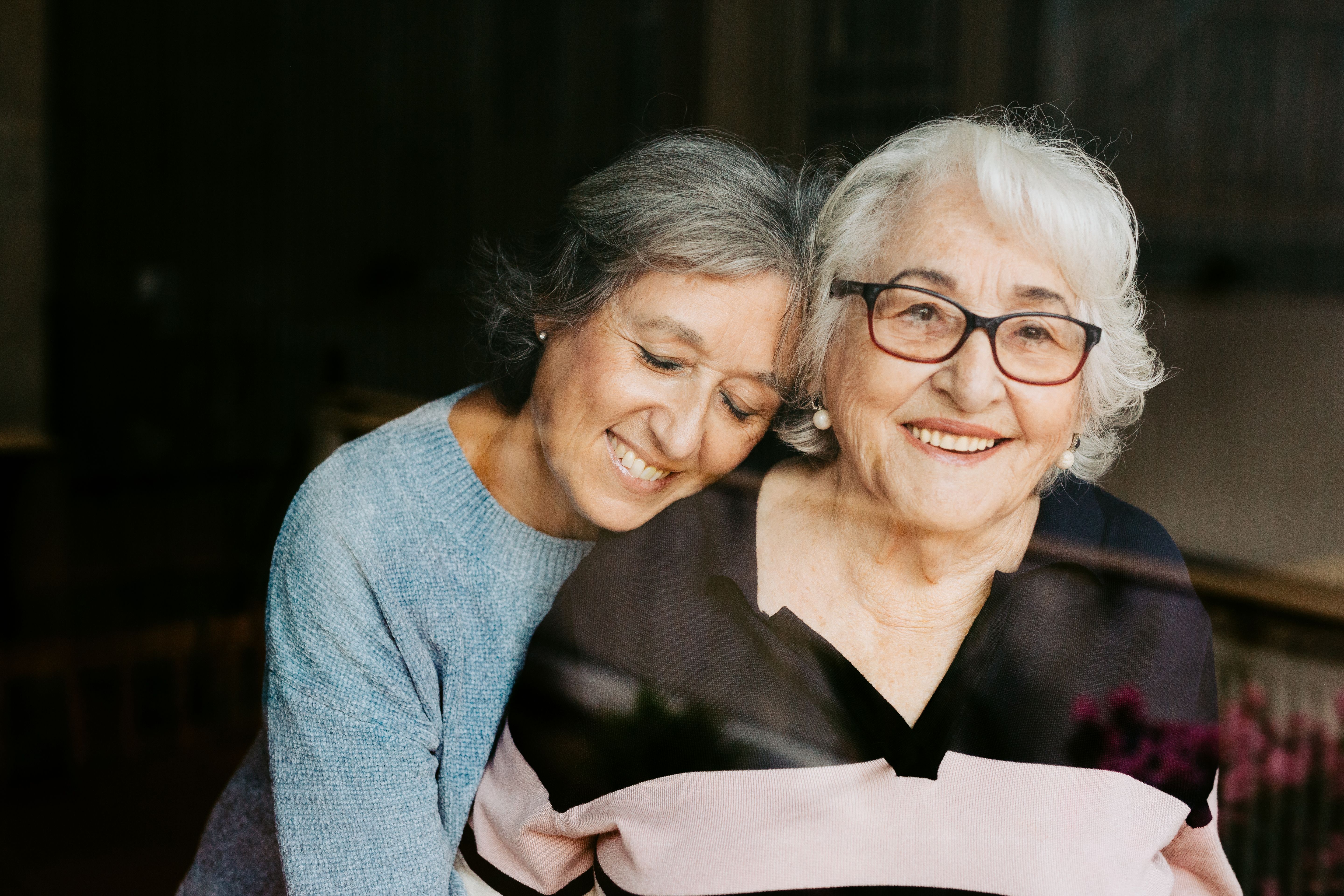 Portrait of an elderly mother an her daughter.