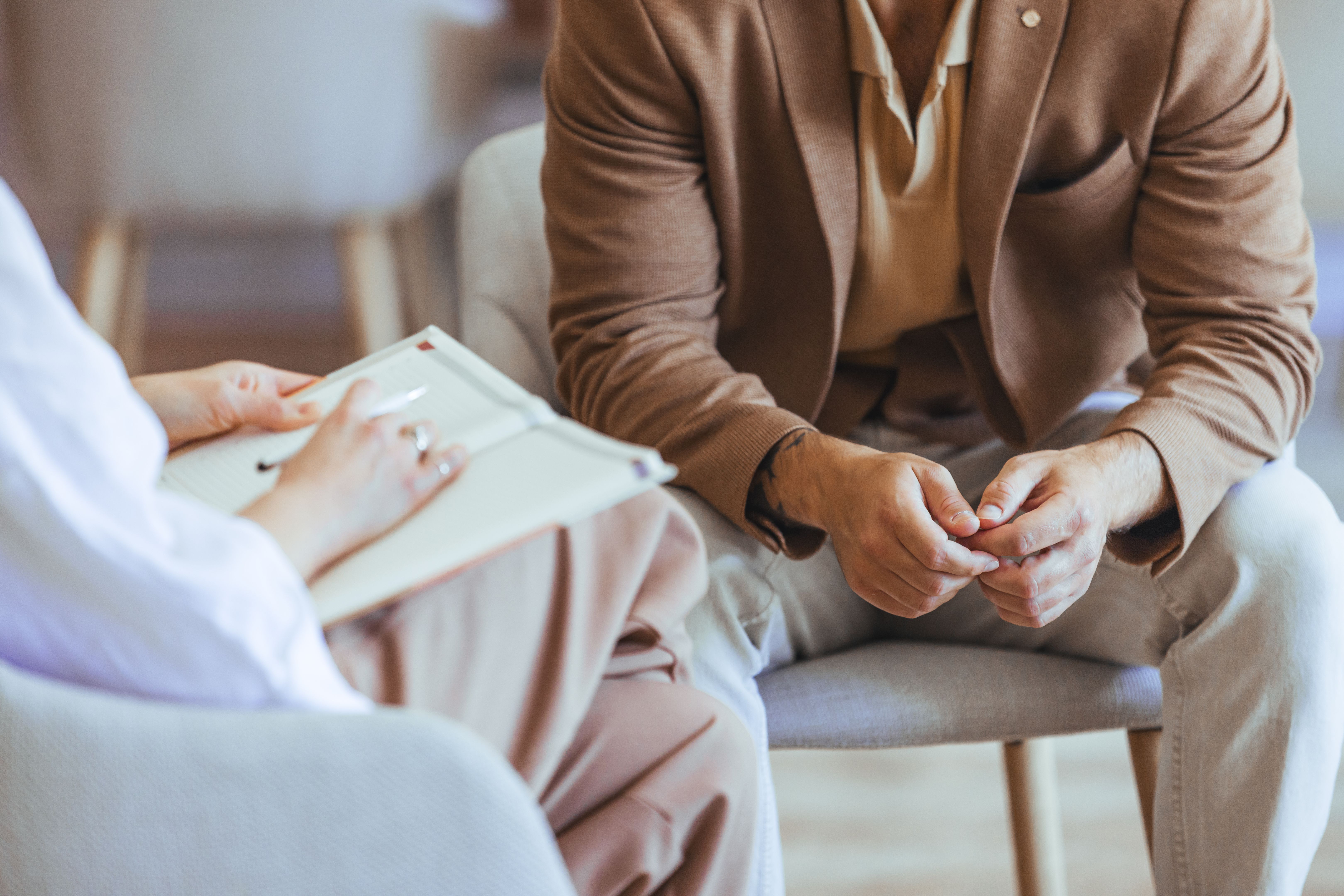 man talking to therapist