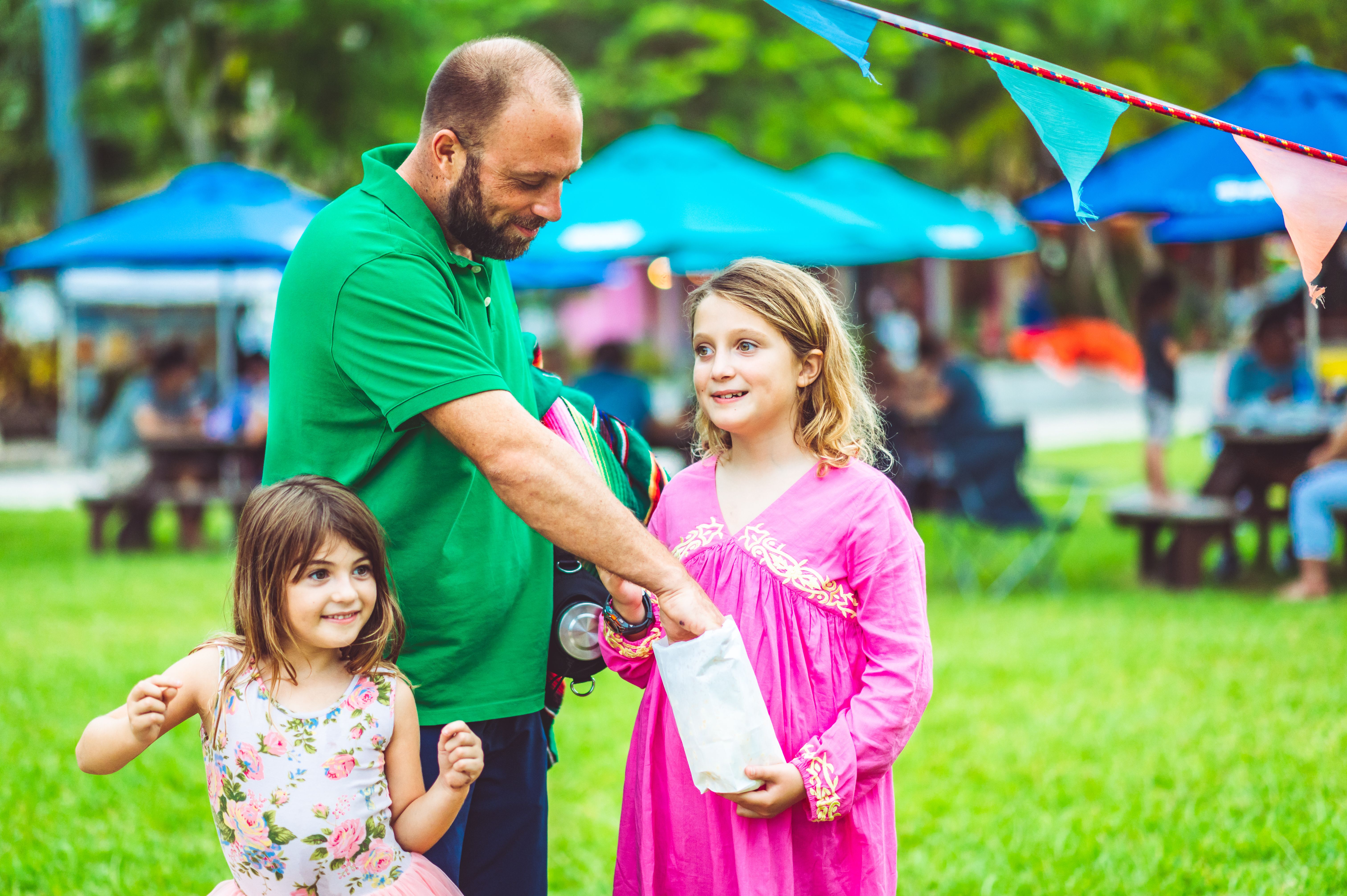 family at dinosaur fair
