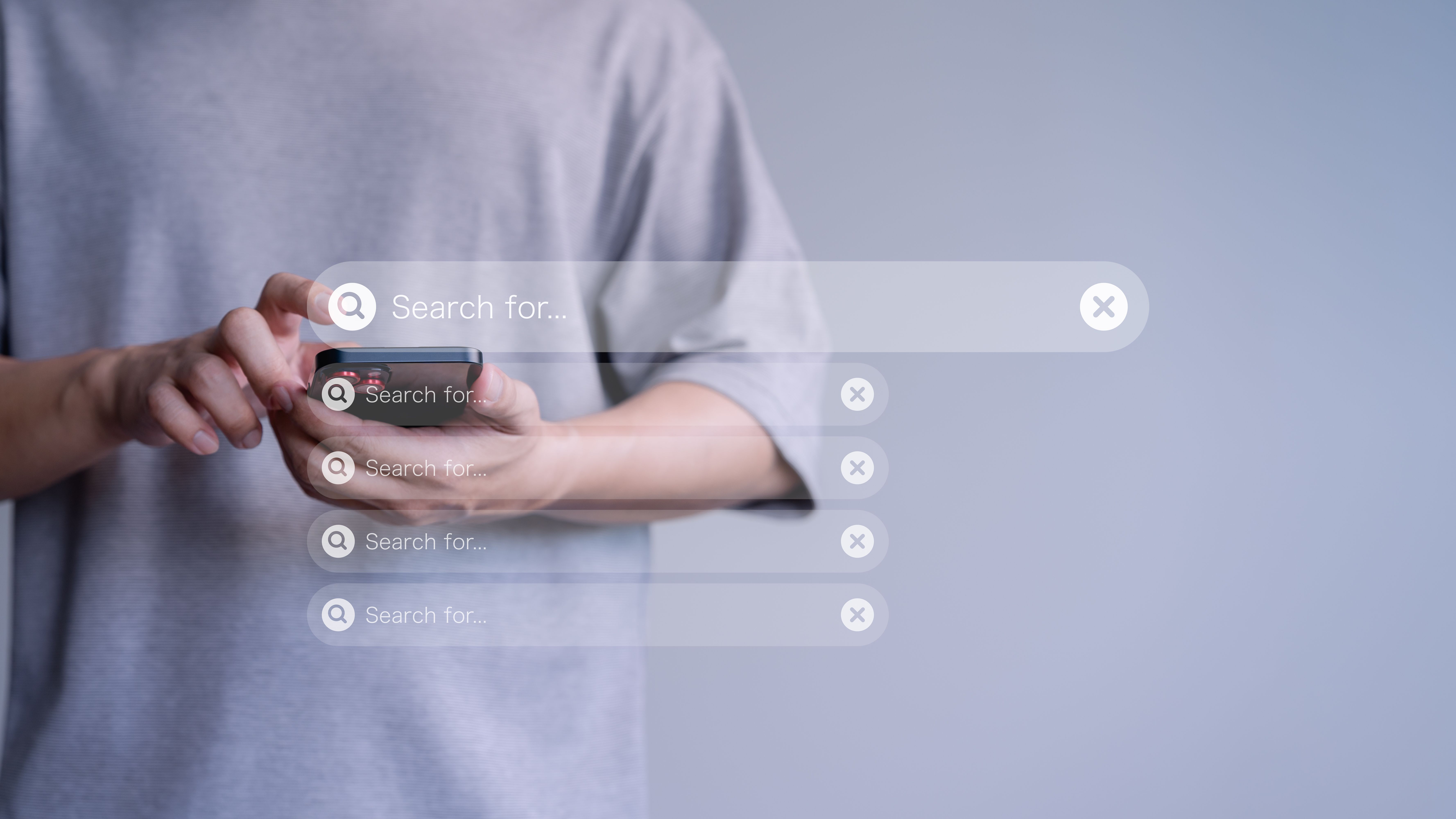 Man using a mobile phone searching browsing internet data information. Search engine optimization the internet with search bar. Best SEO technology networking. Man using a mobile phone searching browsing internet data information. Search engine optimization the internet with search bar. Best SEO technology networking.