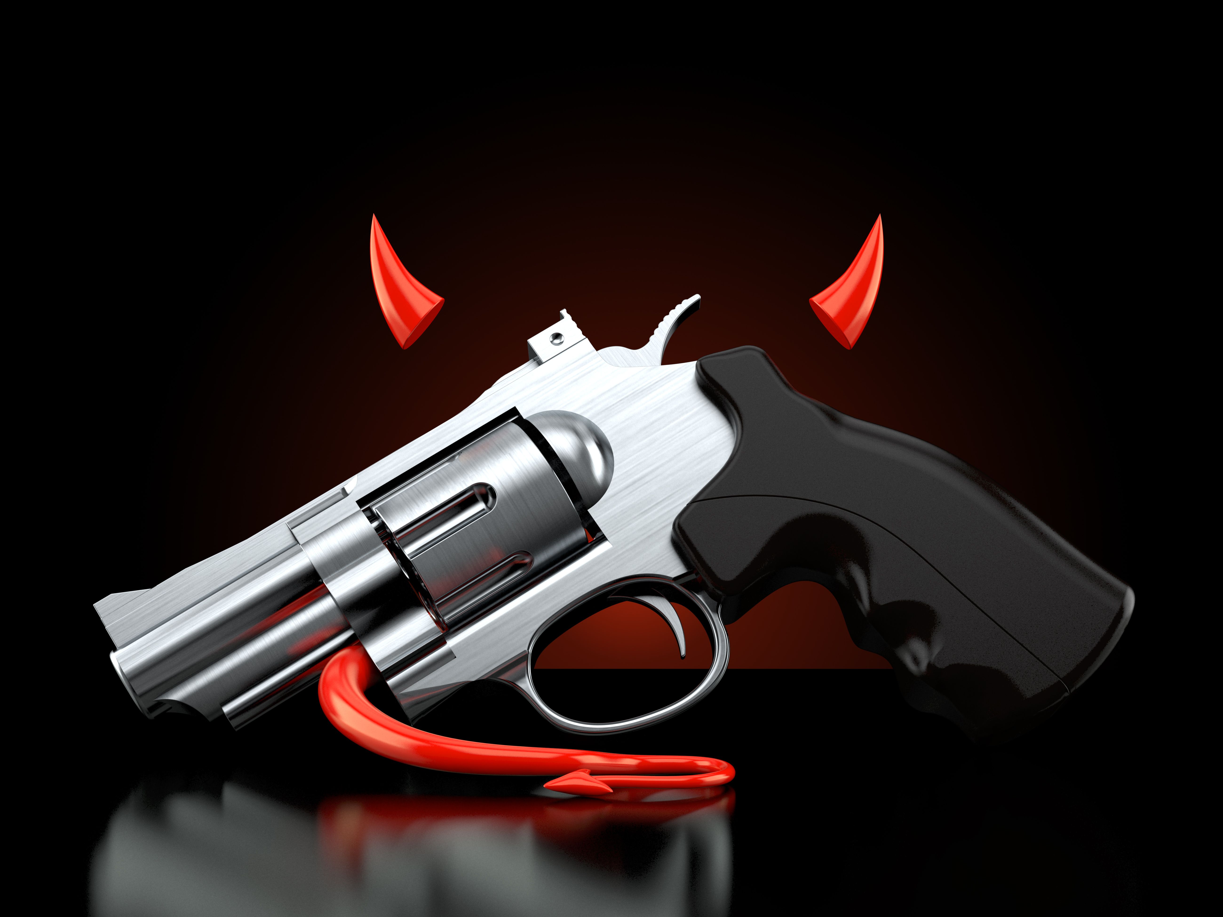 Gun with devil horns and tail