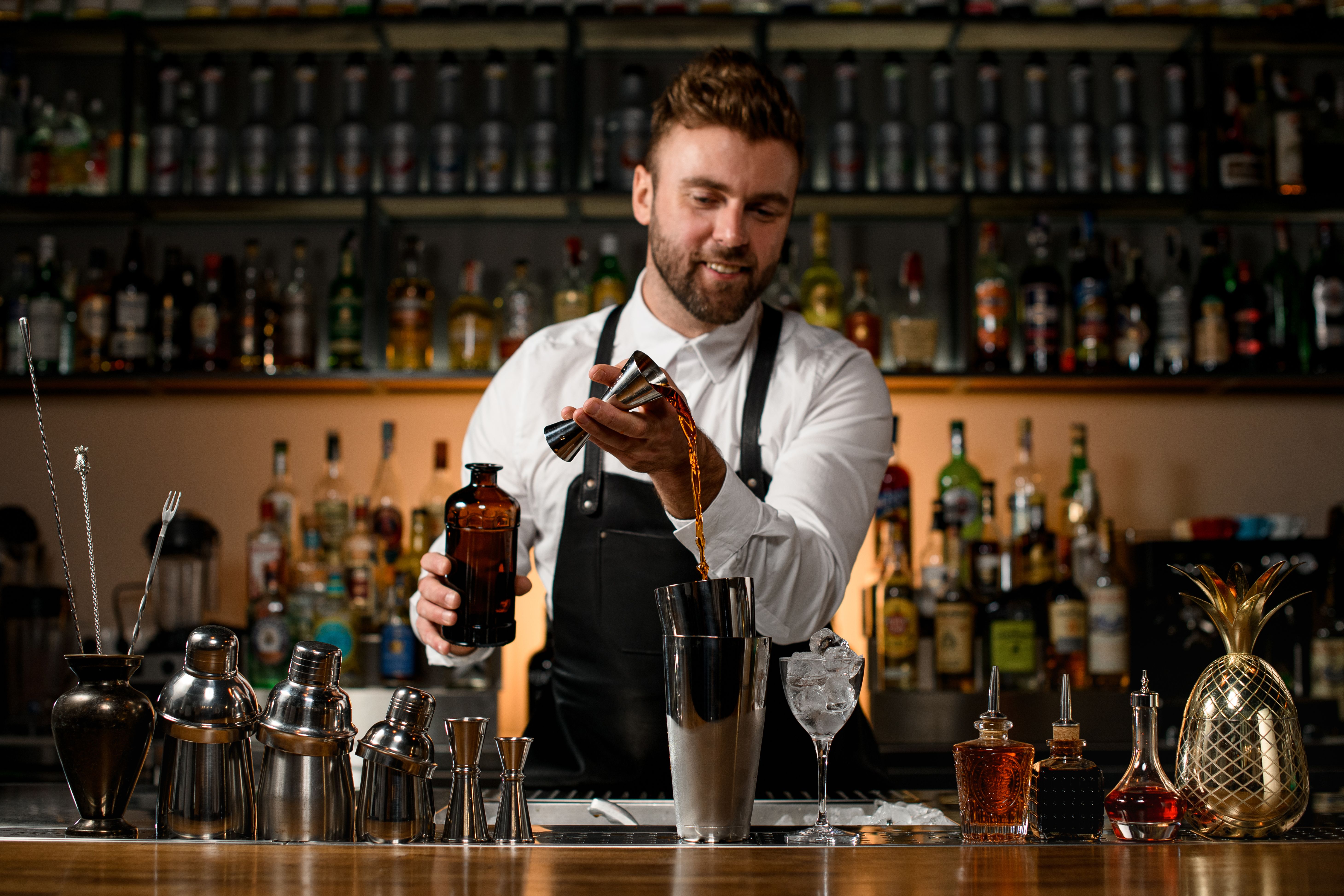 bartender pouring drink