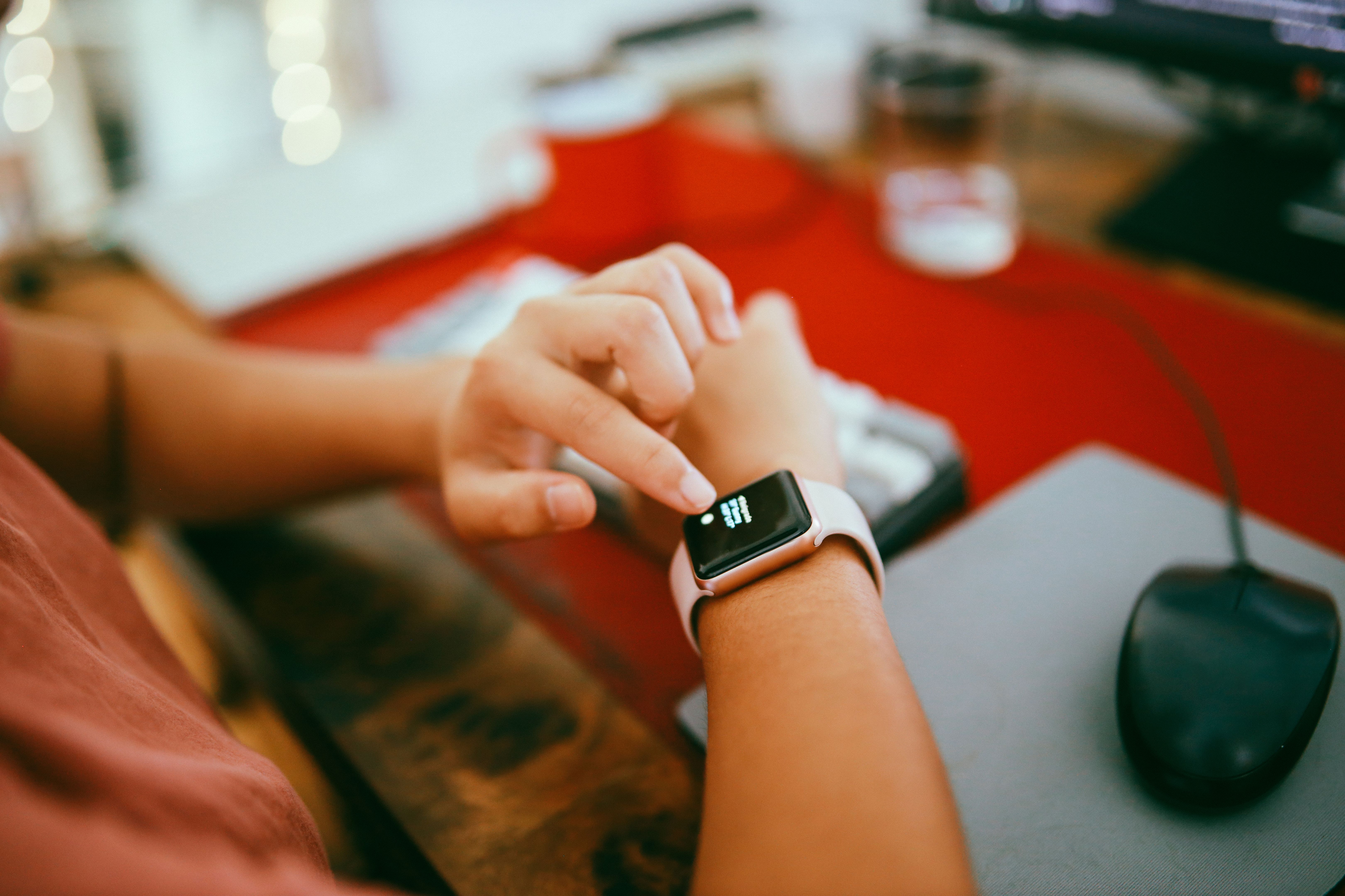 Close up of a girl looking at her smart watch