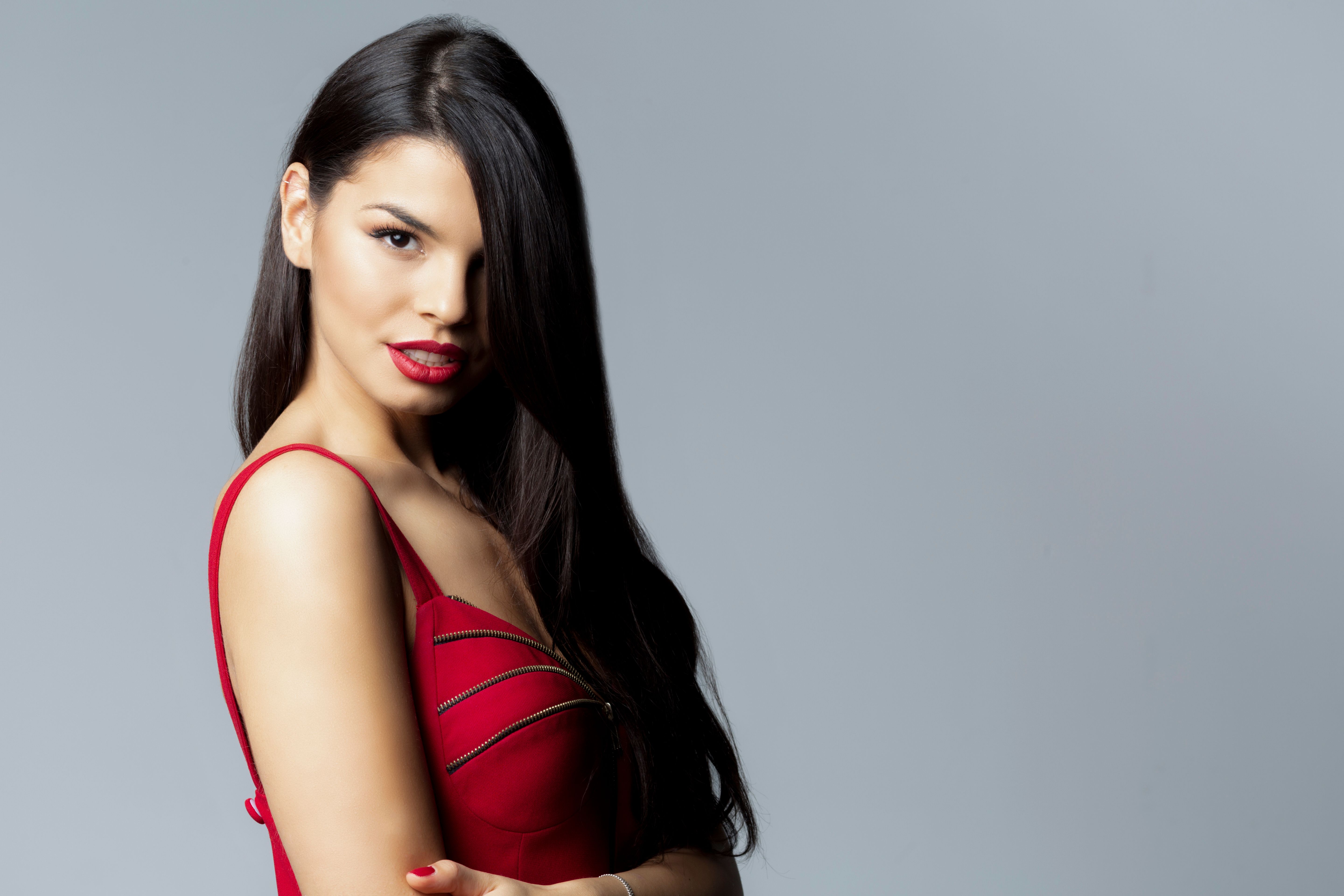 Studio portrait of a beautiful young Caucasian woman doing a photo shoot