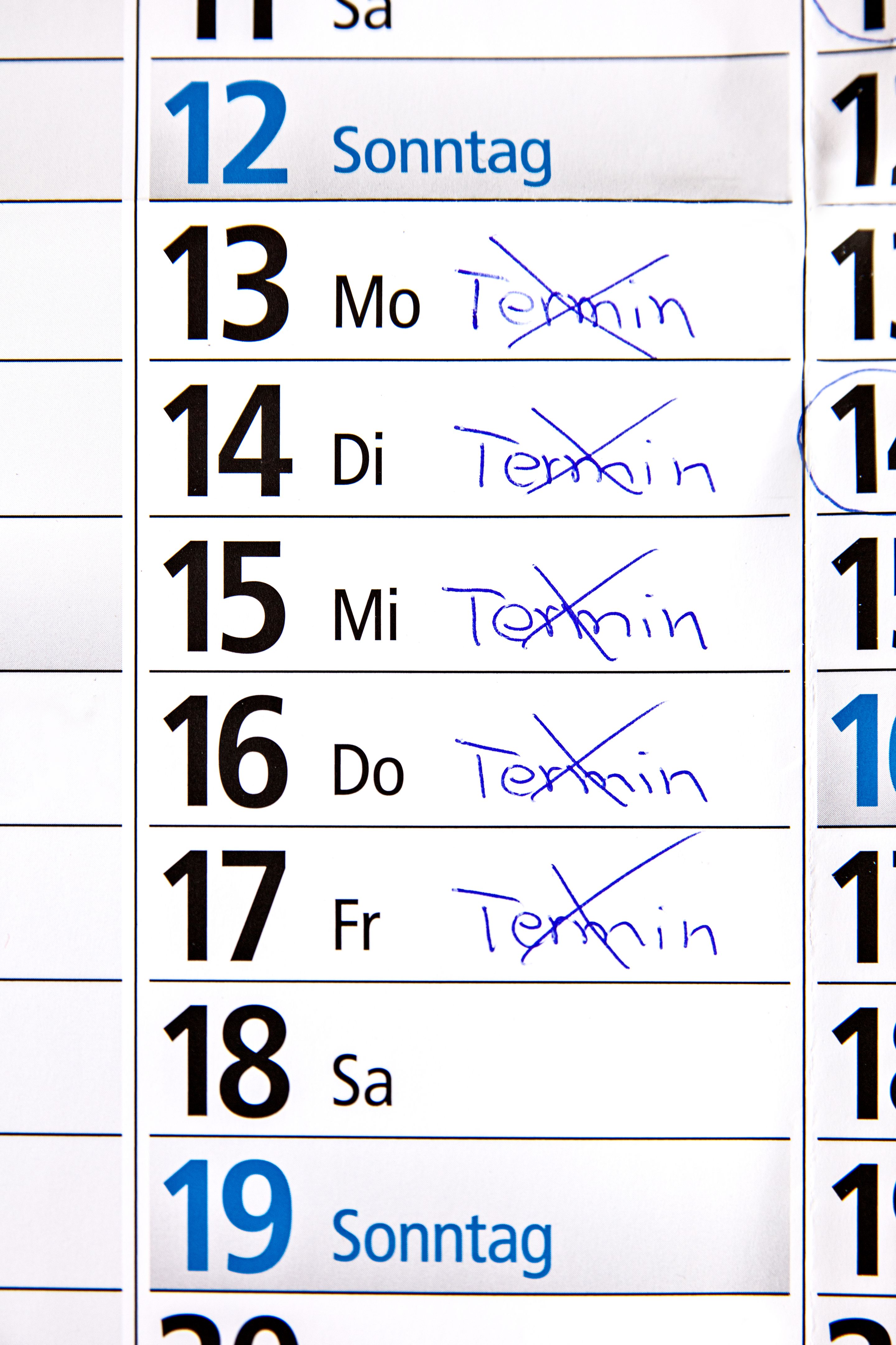 German calendar with cancelled word Termin which means meeting, repercussion of the coronavirus