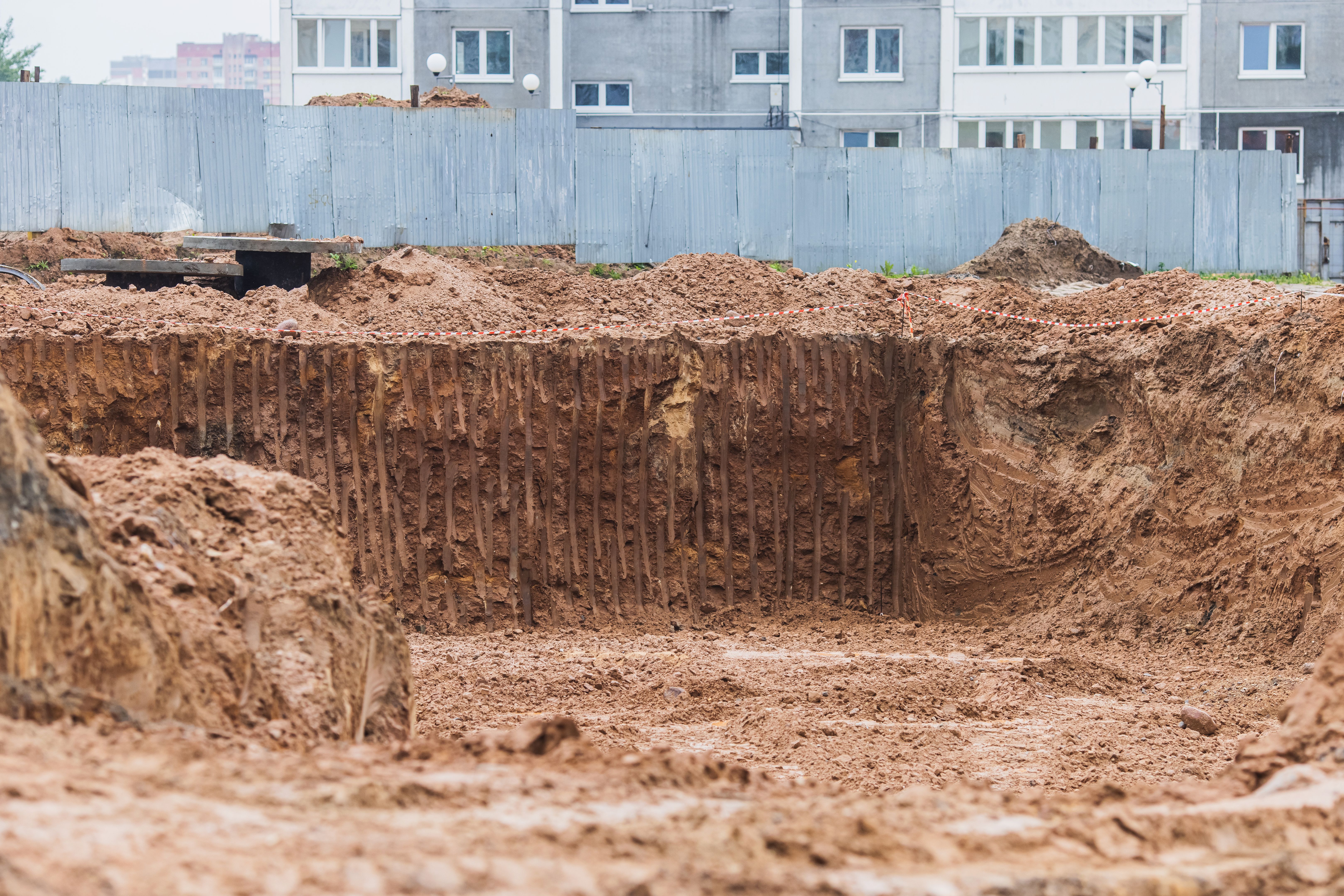 Excavation pit. Construction of house