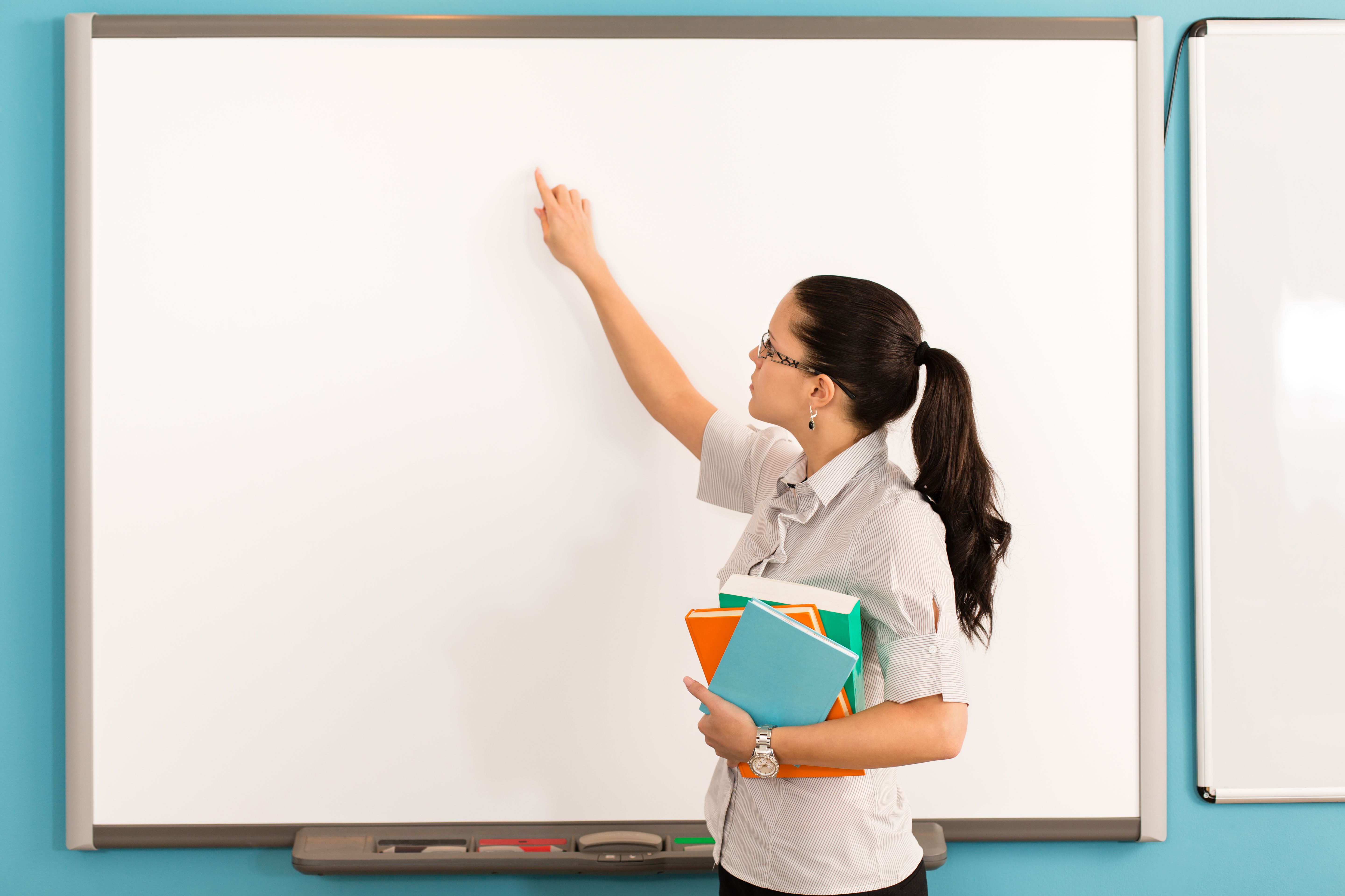 teacher using smart board