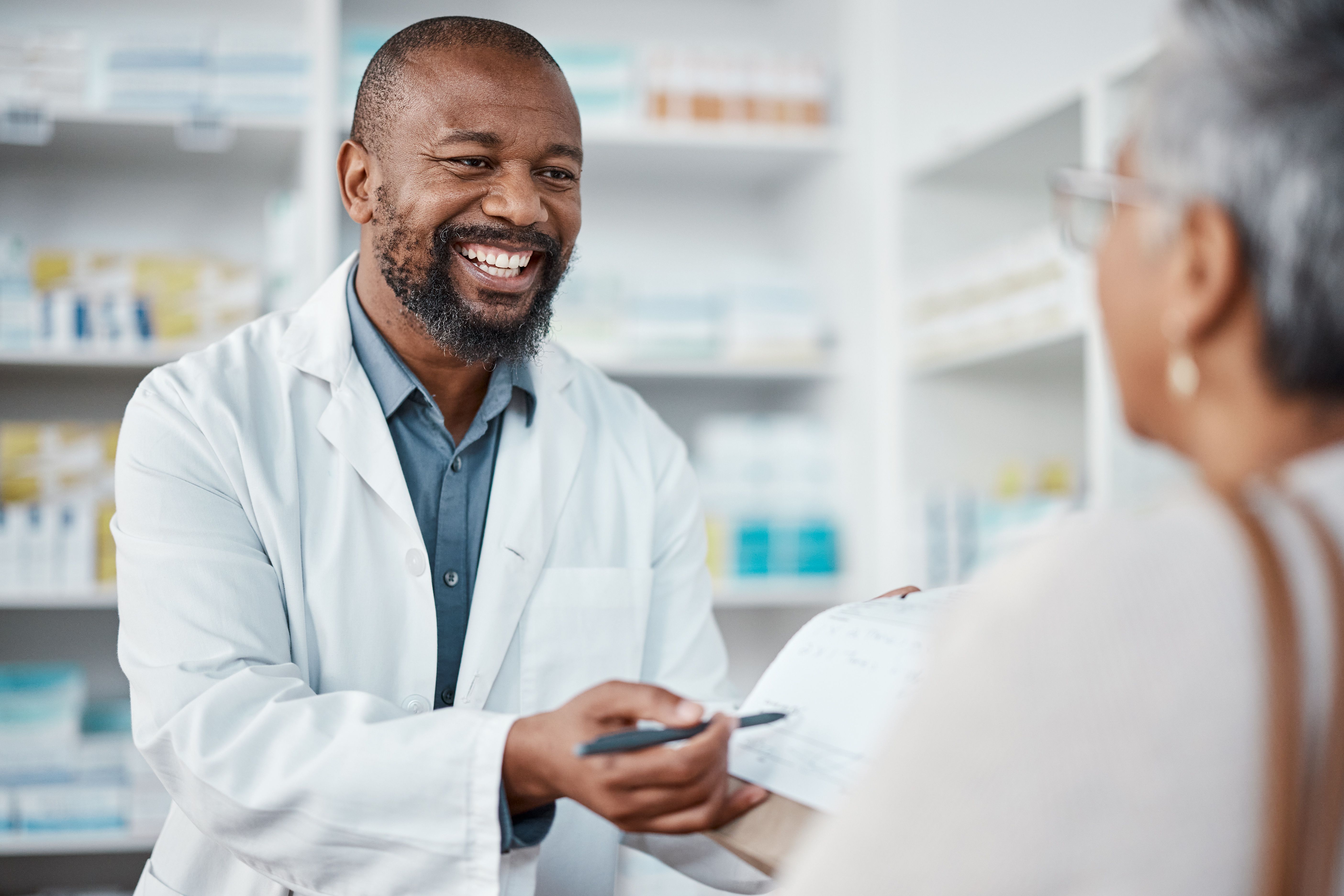 pharmacist talking with patient