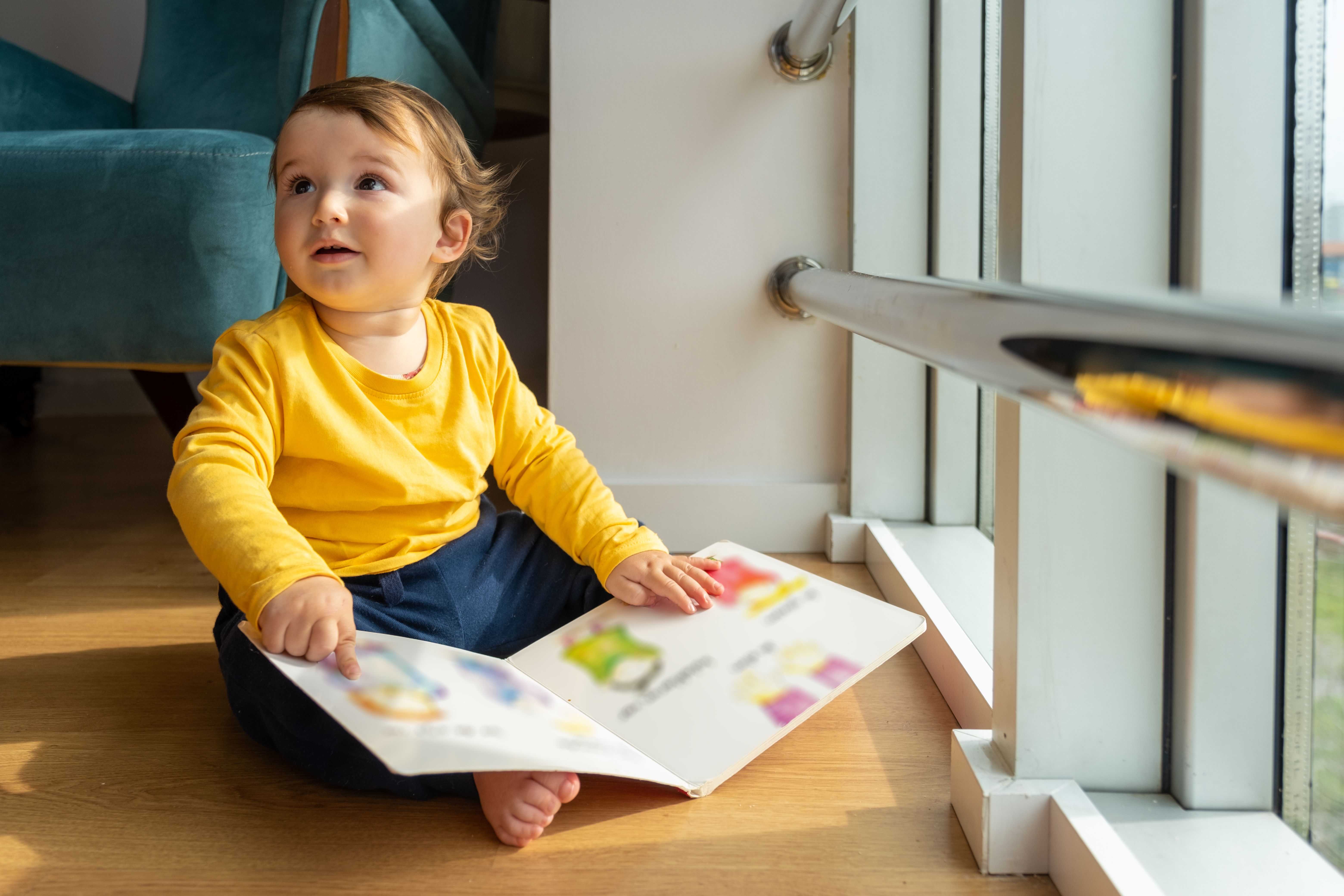 happy toddler reading