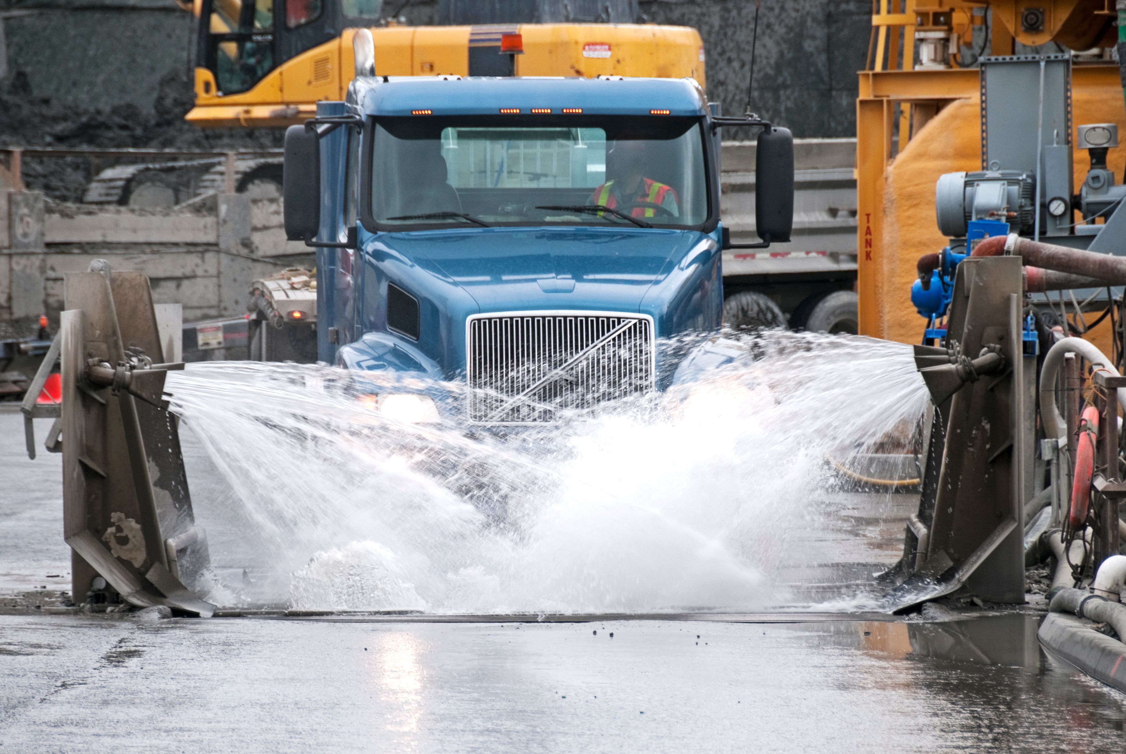Truck tire wash for vehicles at construction site Truck tire wash for vehicles at construction site
