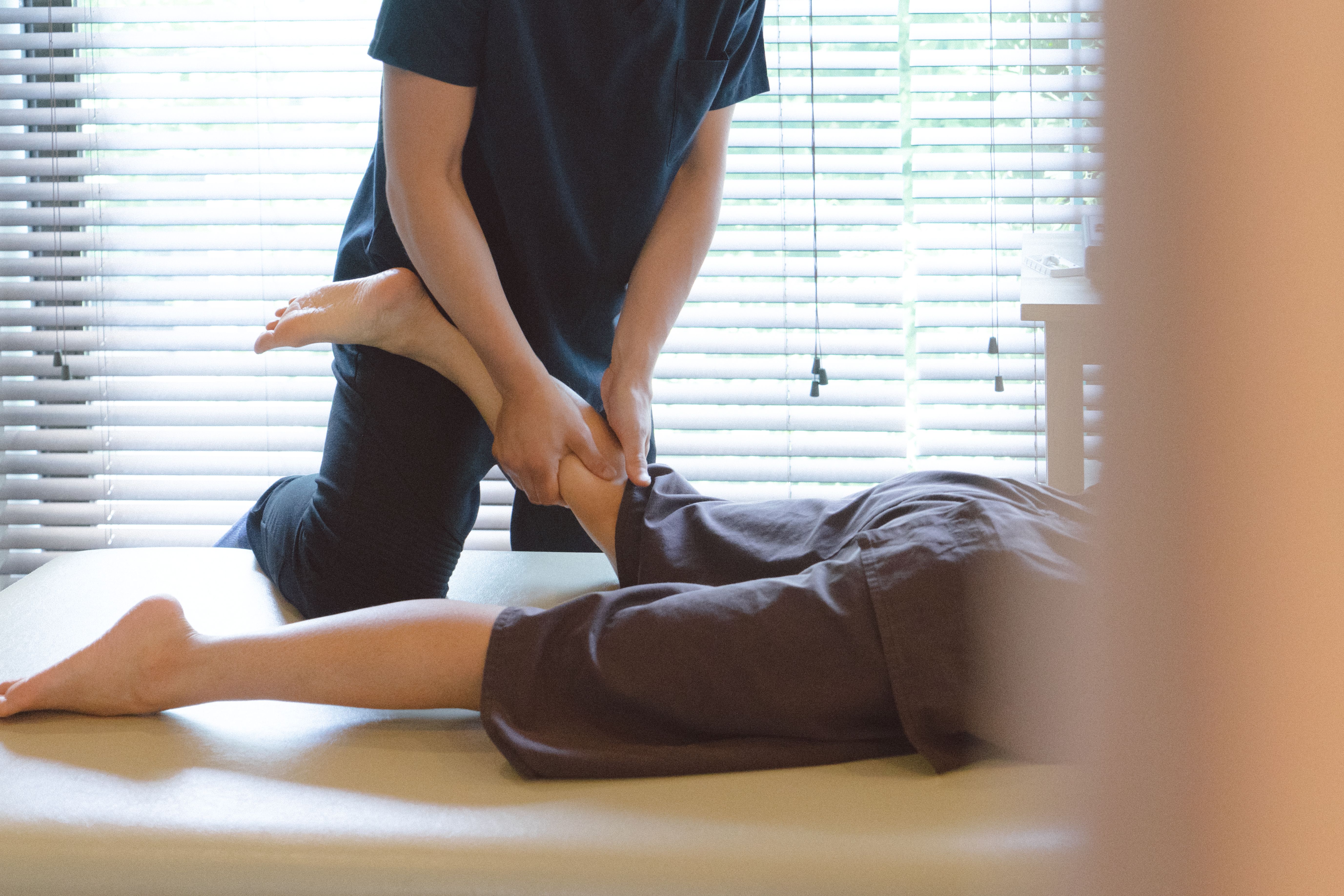 Patient receiving chiropractic treatment