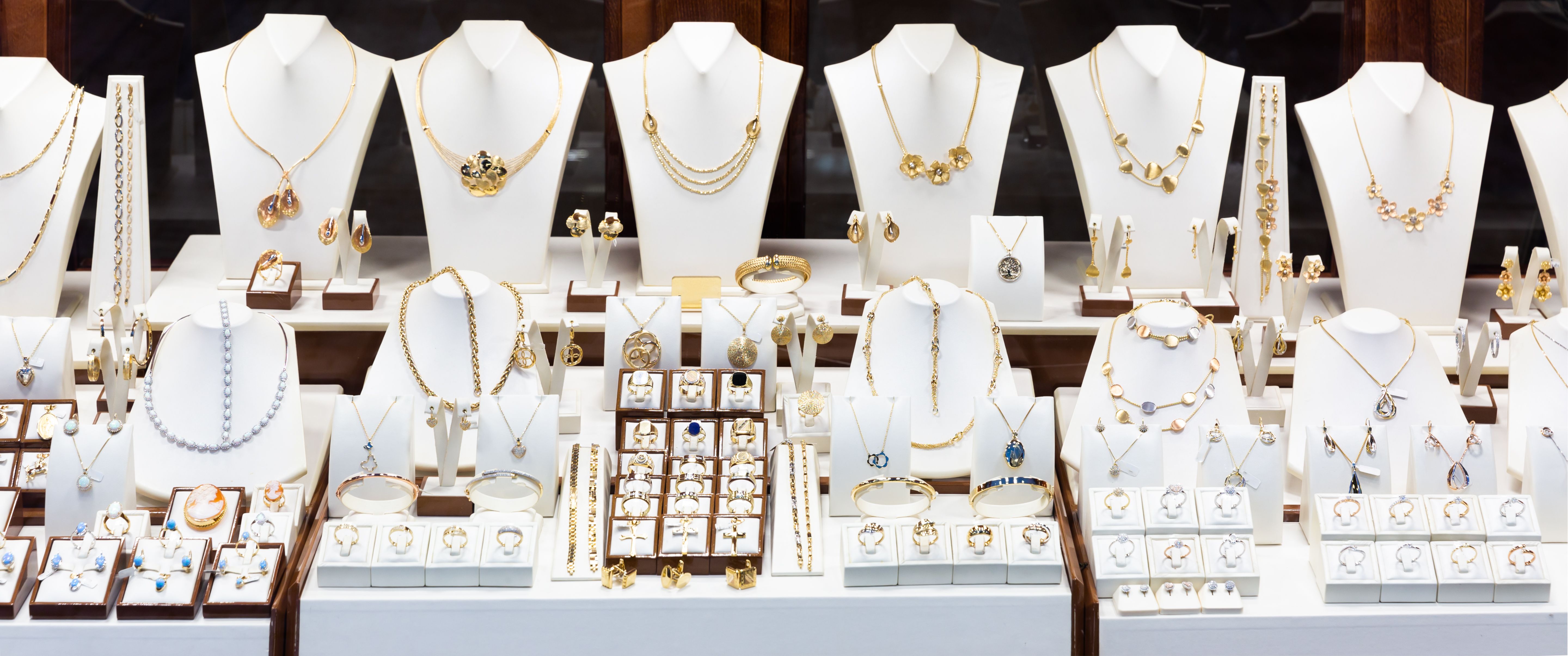 Pendants and bracelets with dimonds in jewelry store