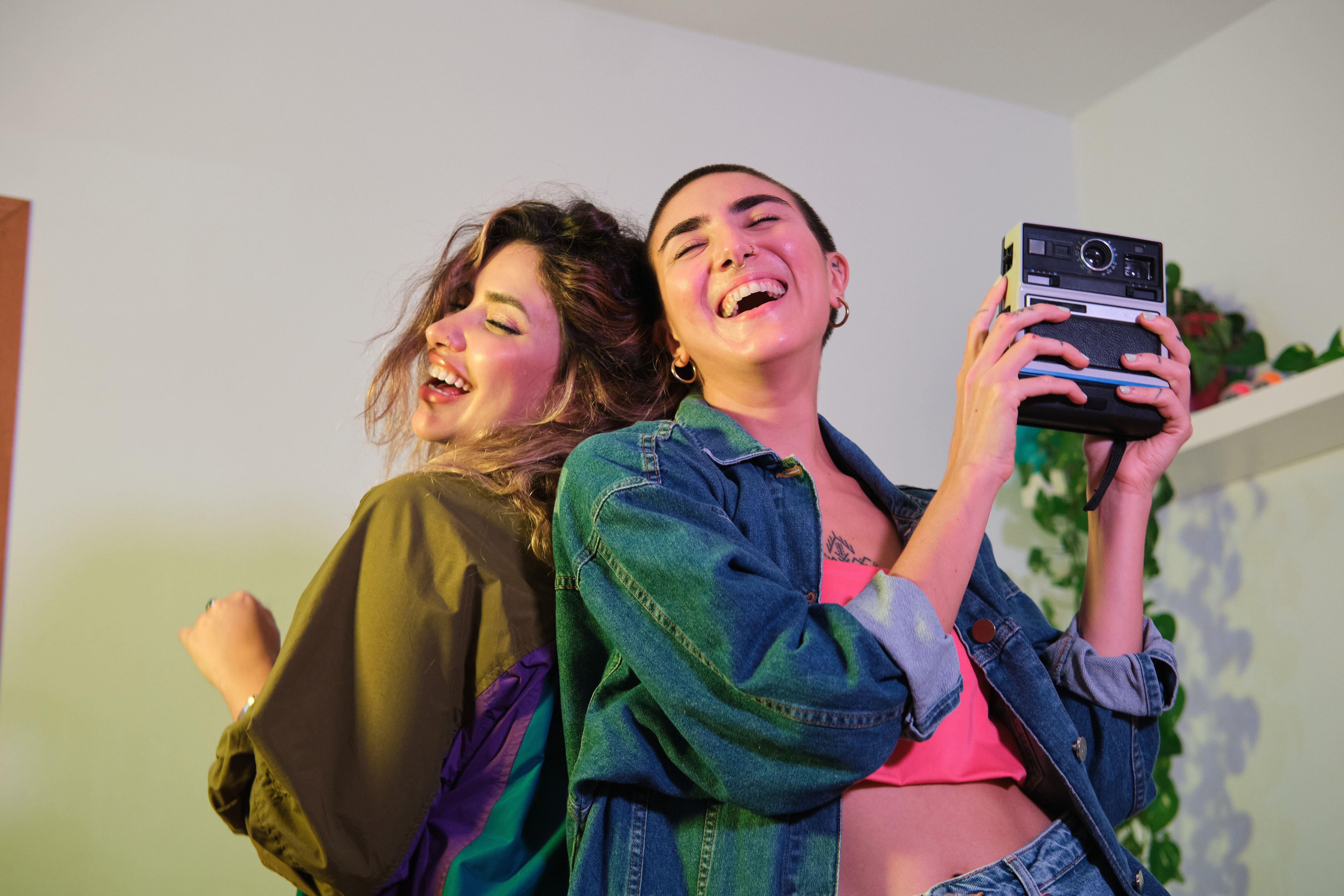 happy people sharing photos