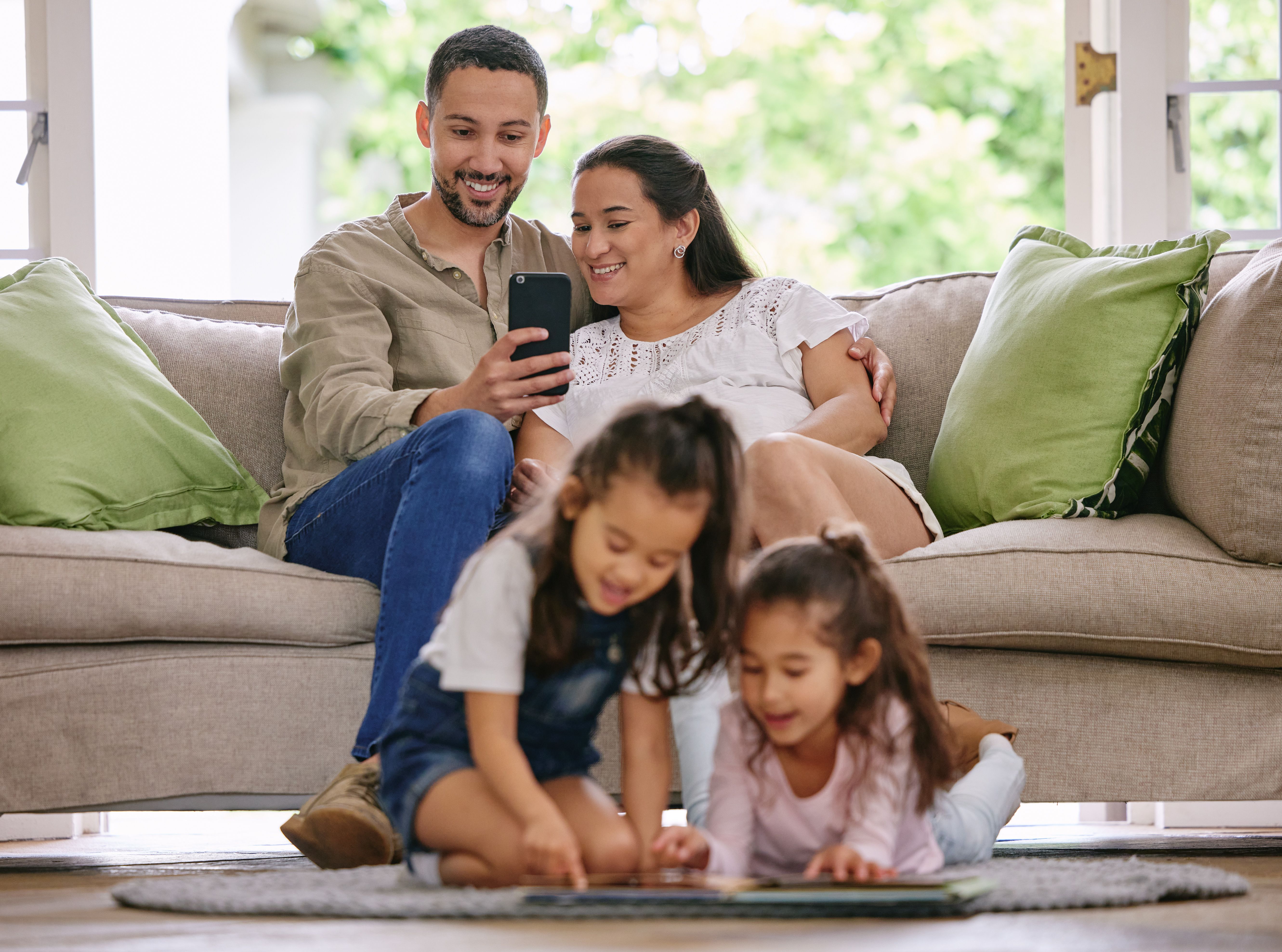 family looking at digital photo album