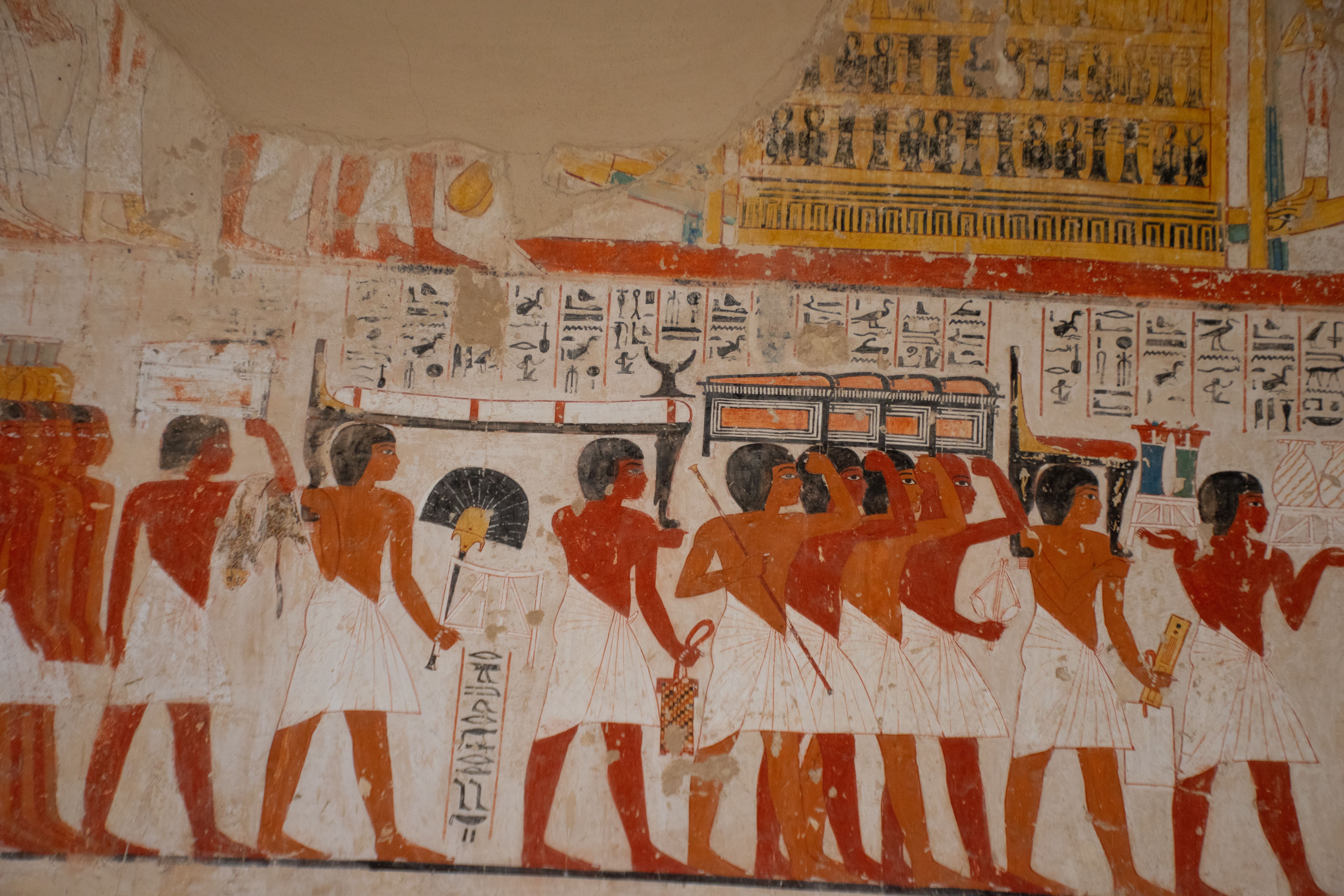 Hieroglyph paintings on the wall in the tombs at the Valley of the Nobles.