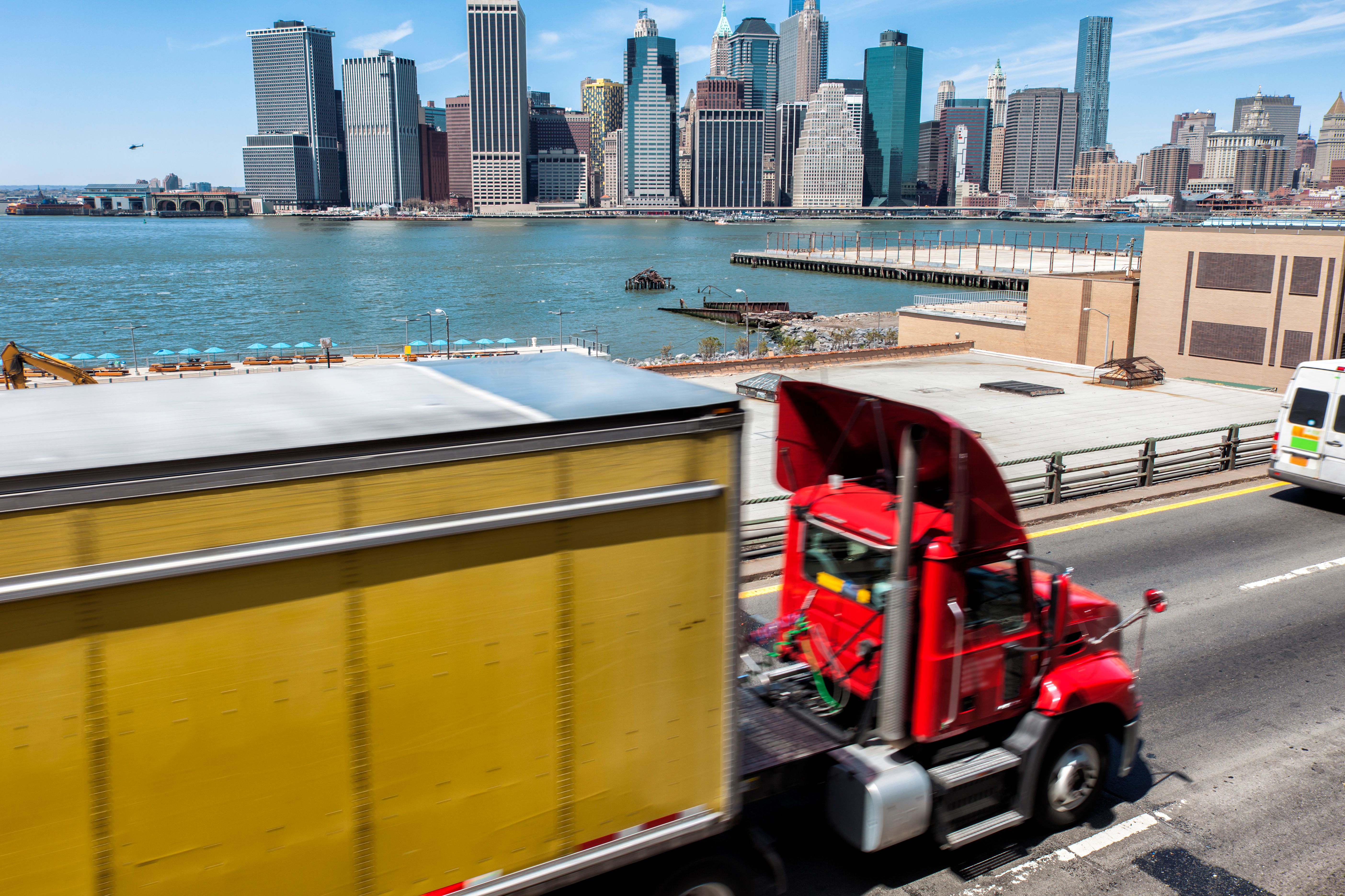 Semi Truck On Brooklyn Expressway, New York Skyline in Background