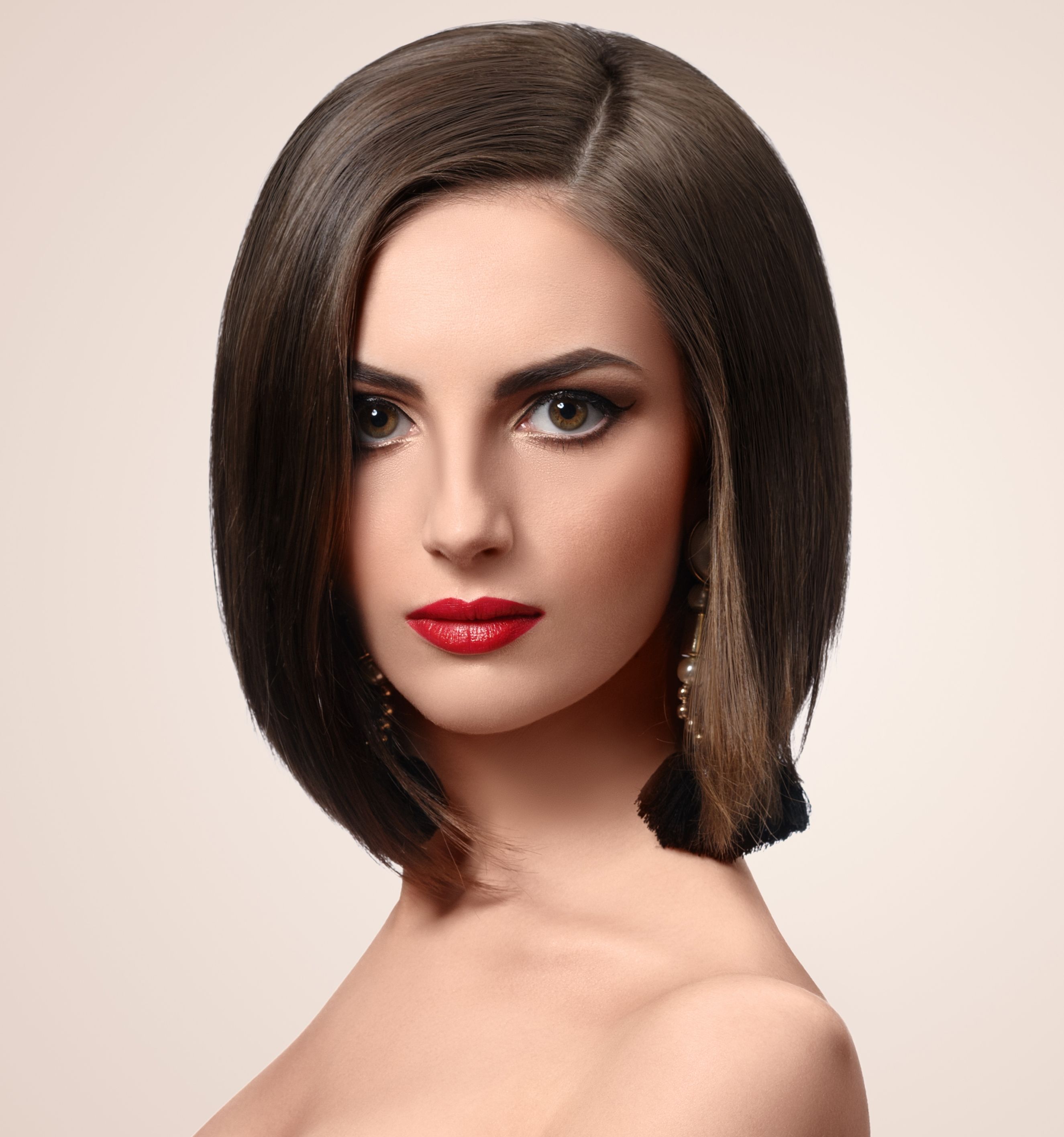 Beautiful elegant young woman posing in studio