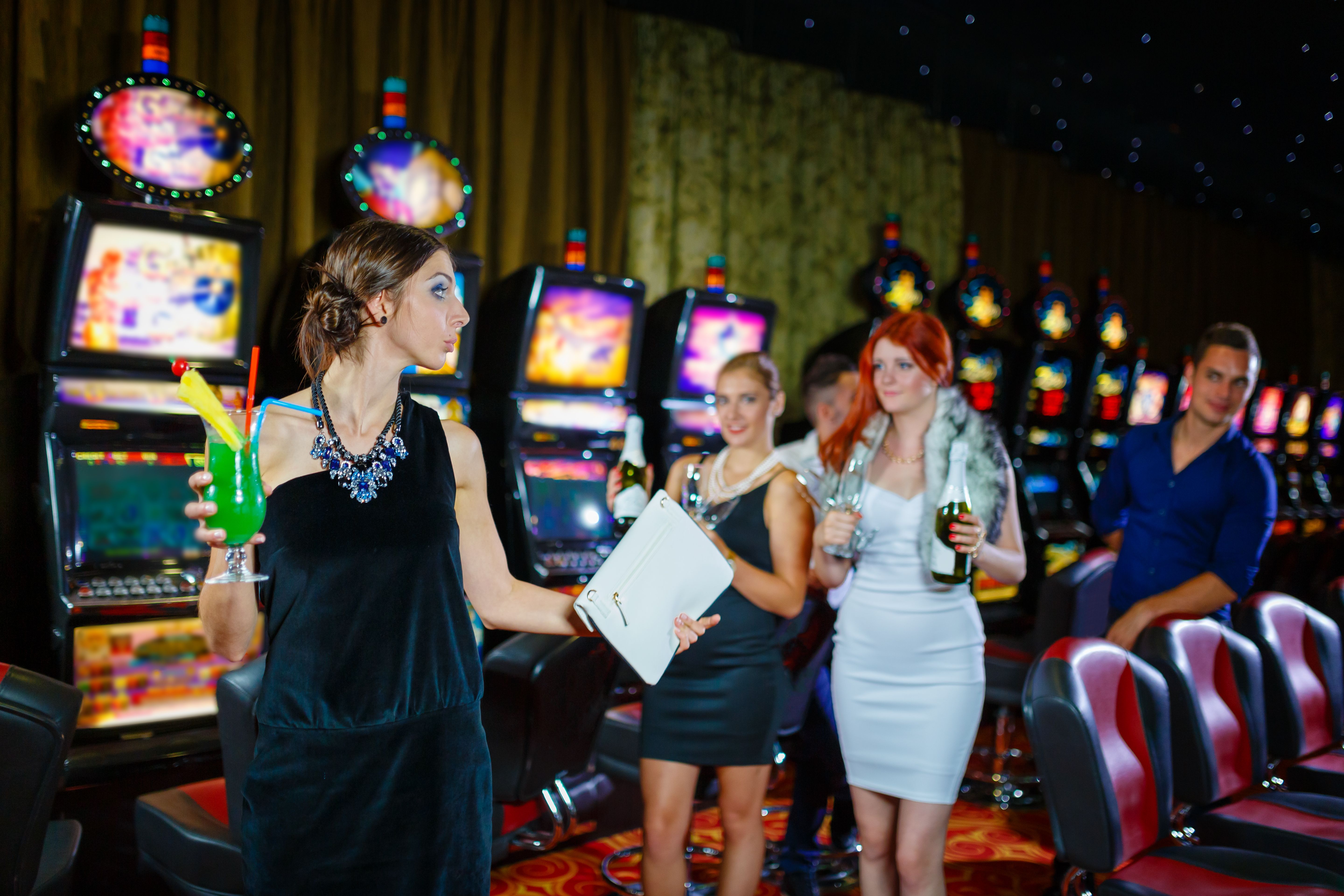 Friends having fun arriving in casino Friends having fun arriving in casino