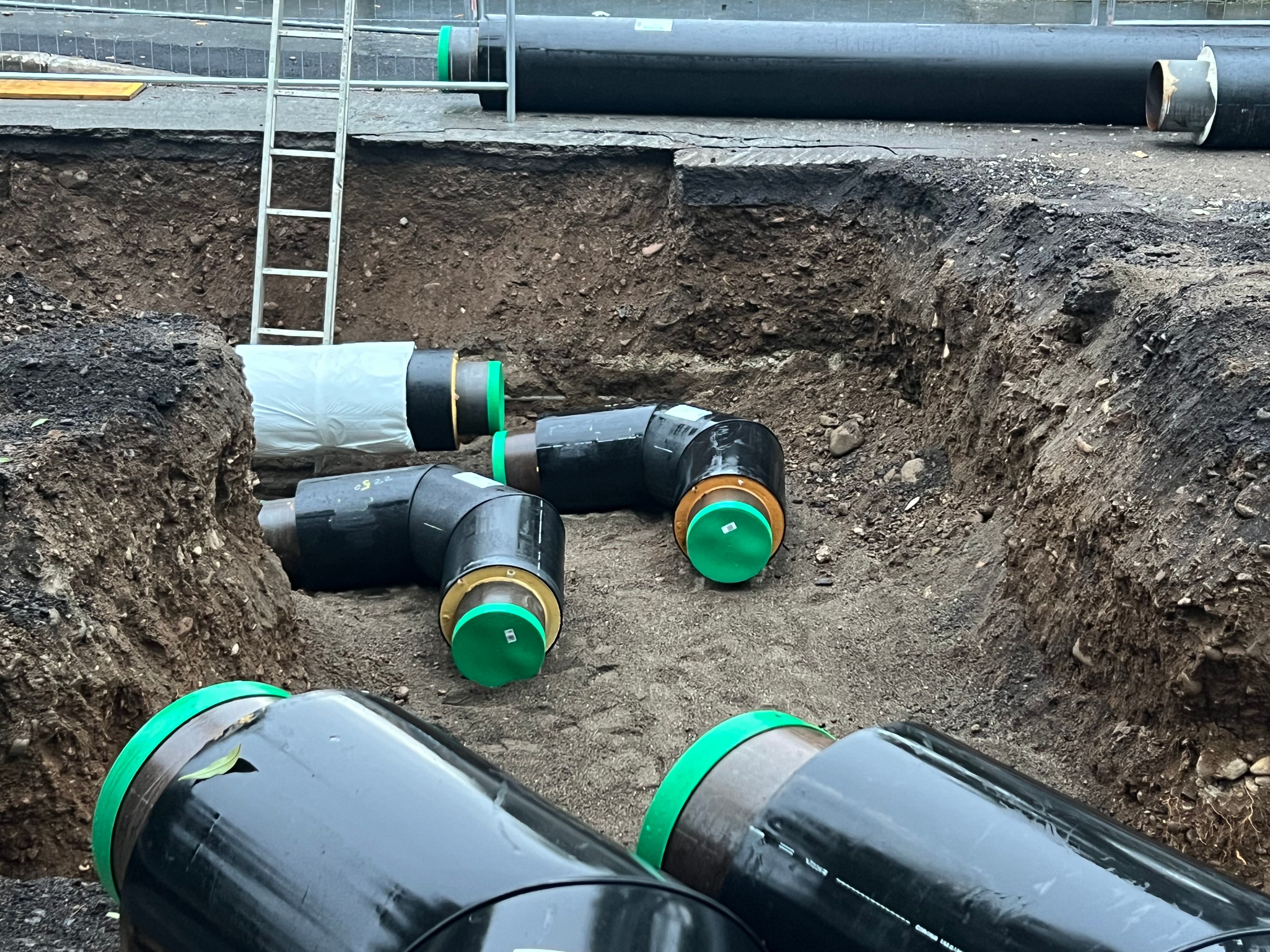 laying of new pipelines for district heating