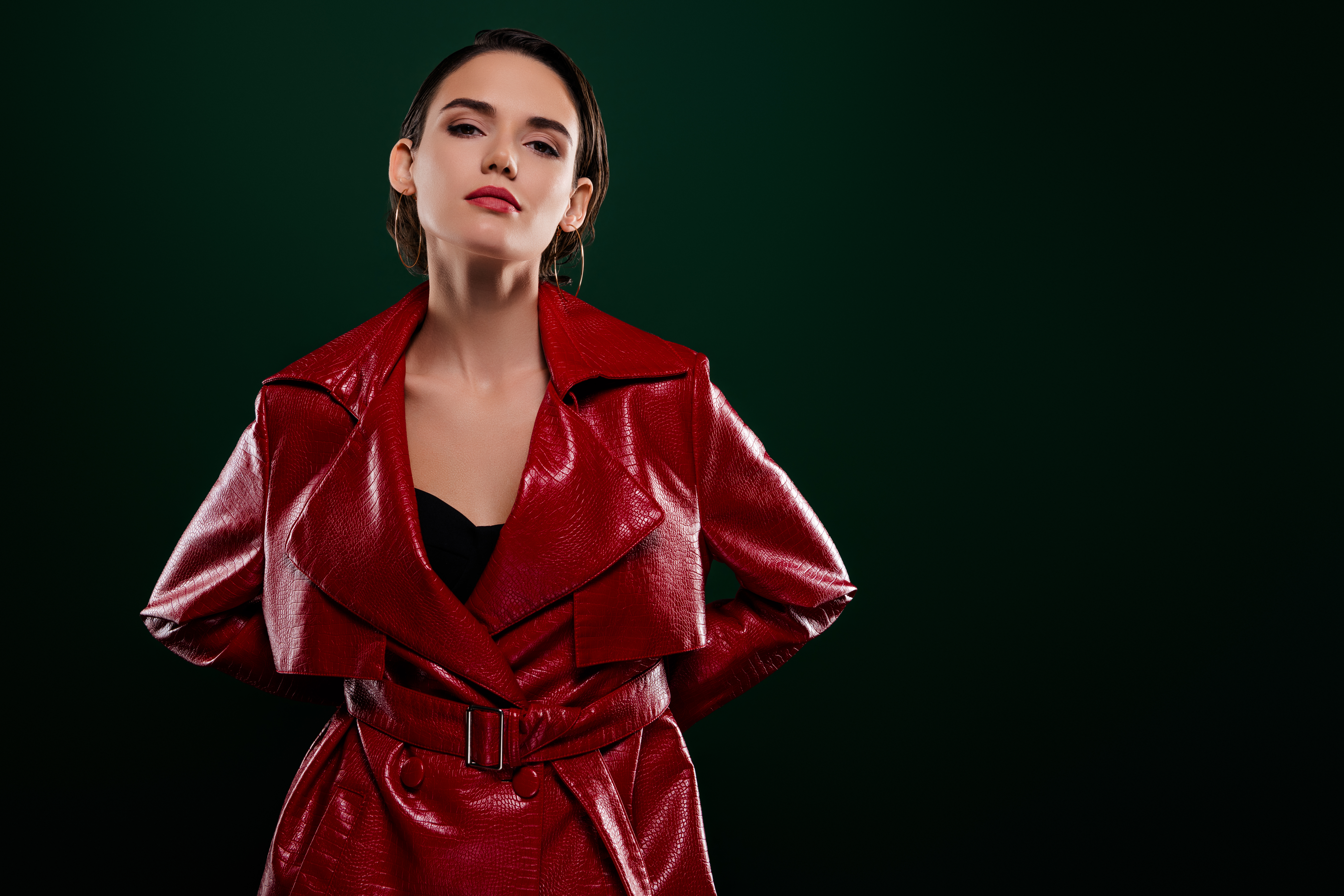 Photo of elegant girl look wear fashionable clothes stand empty space isolated dark color background