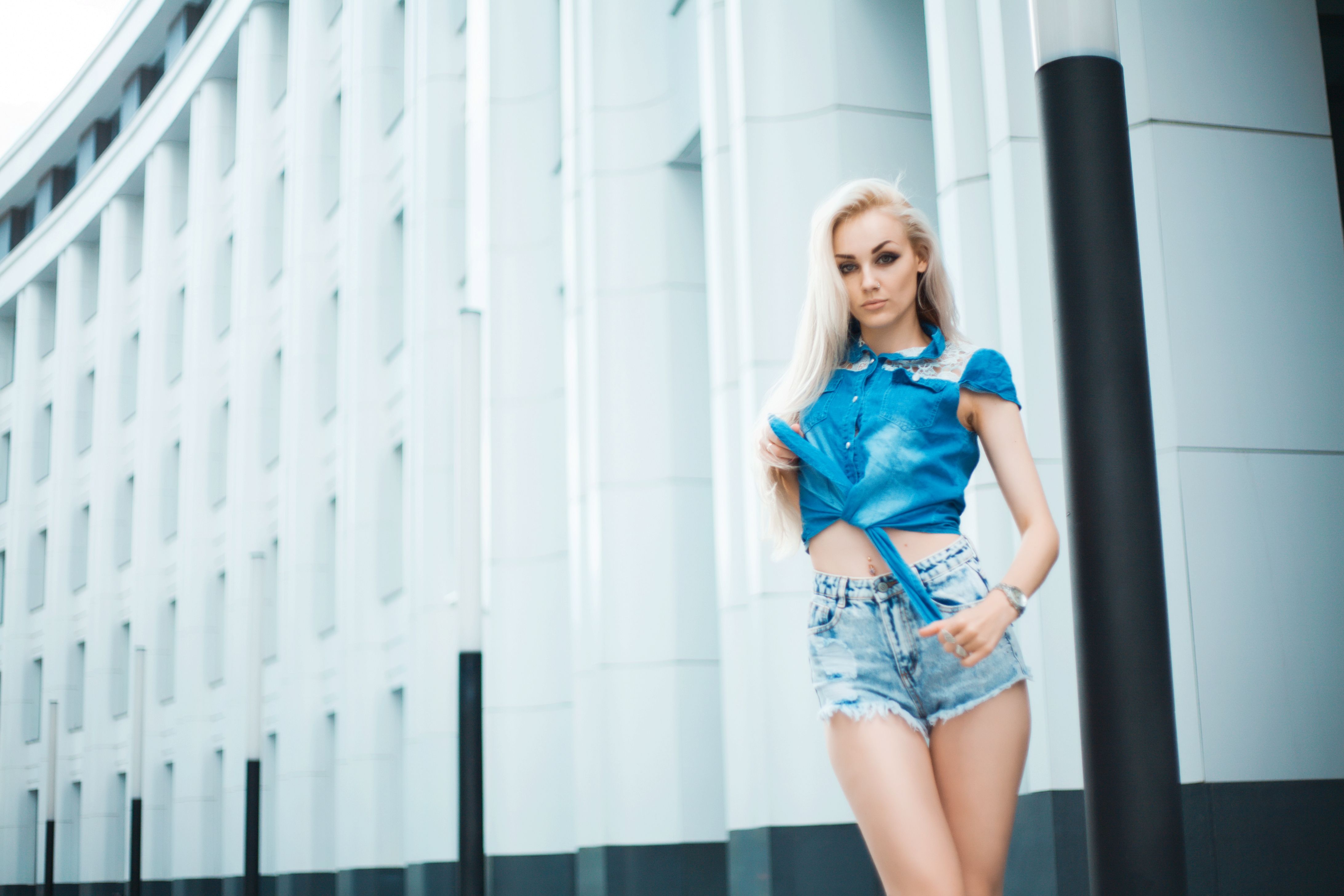 Stylish young woman posing outdoors Stylish young woman posing outdoors